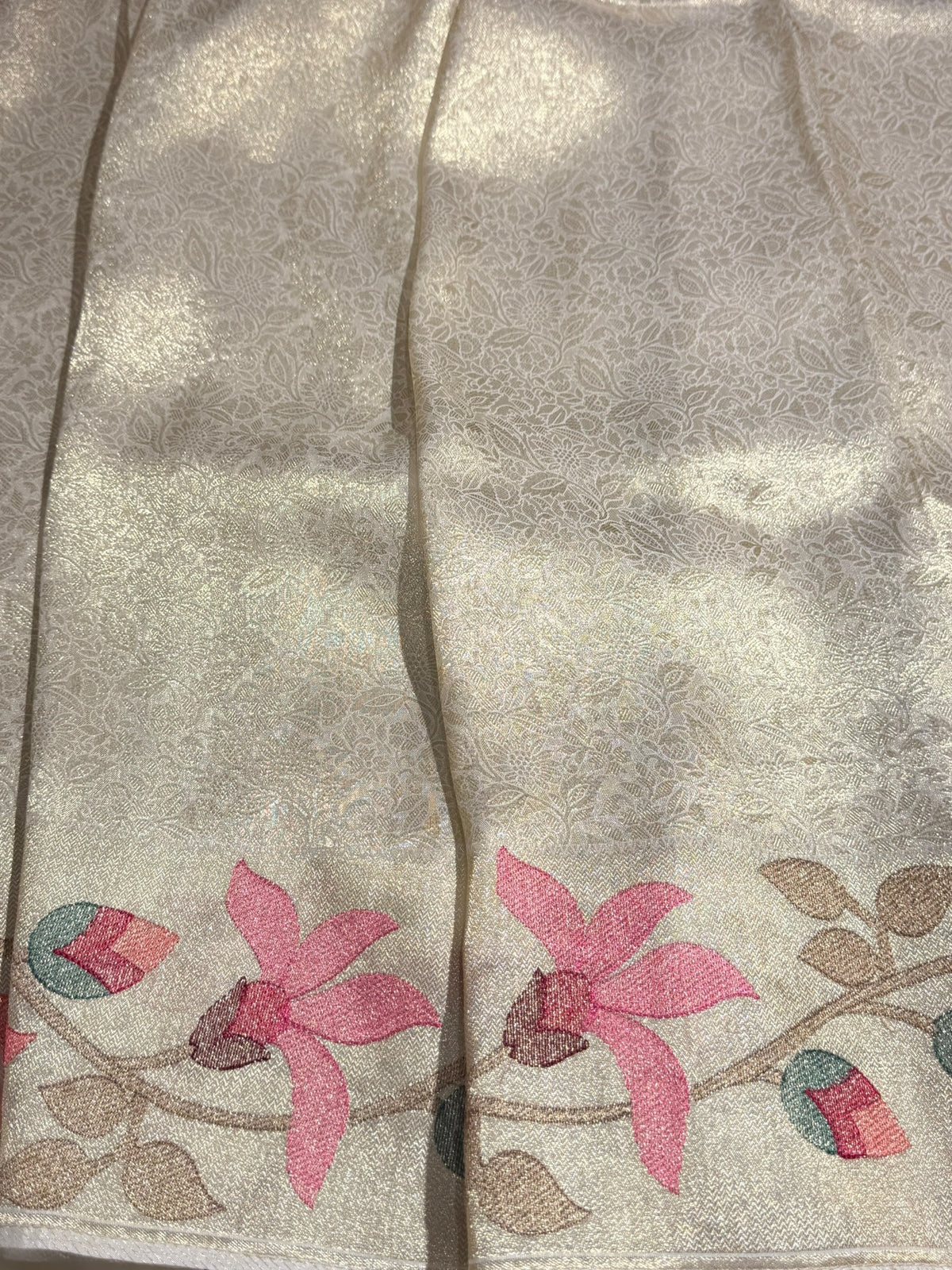 Ivory Banarasi Brocade tissue saree with tonchui style weaving & pythani inspired embroidered border