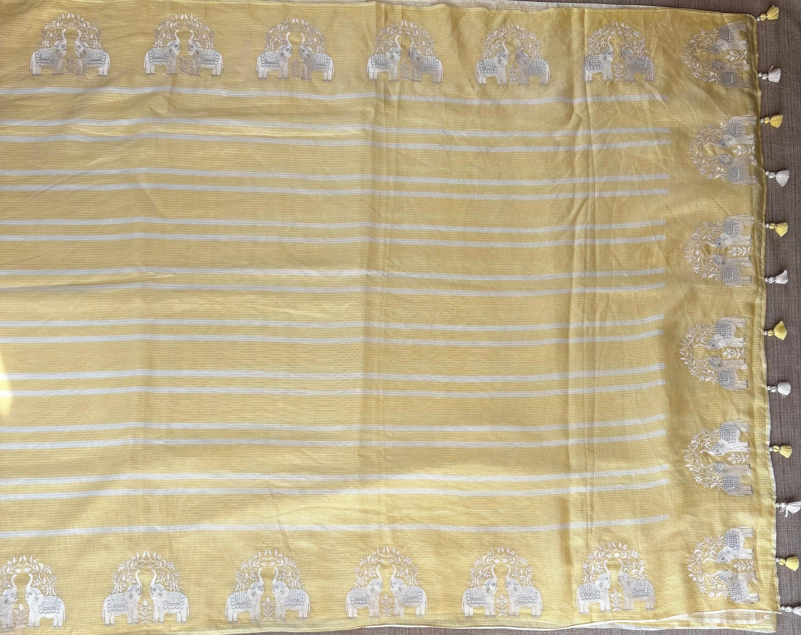 Pastel Yellow Designer Silk kota saree with elephant embroidered border