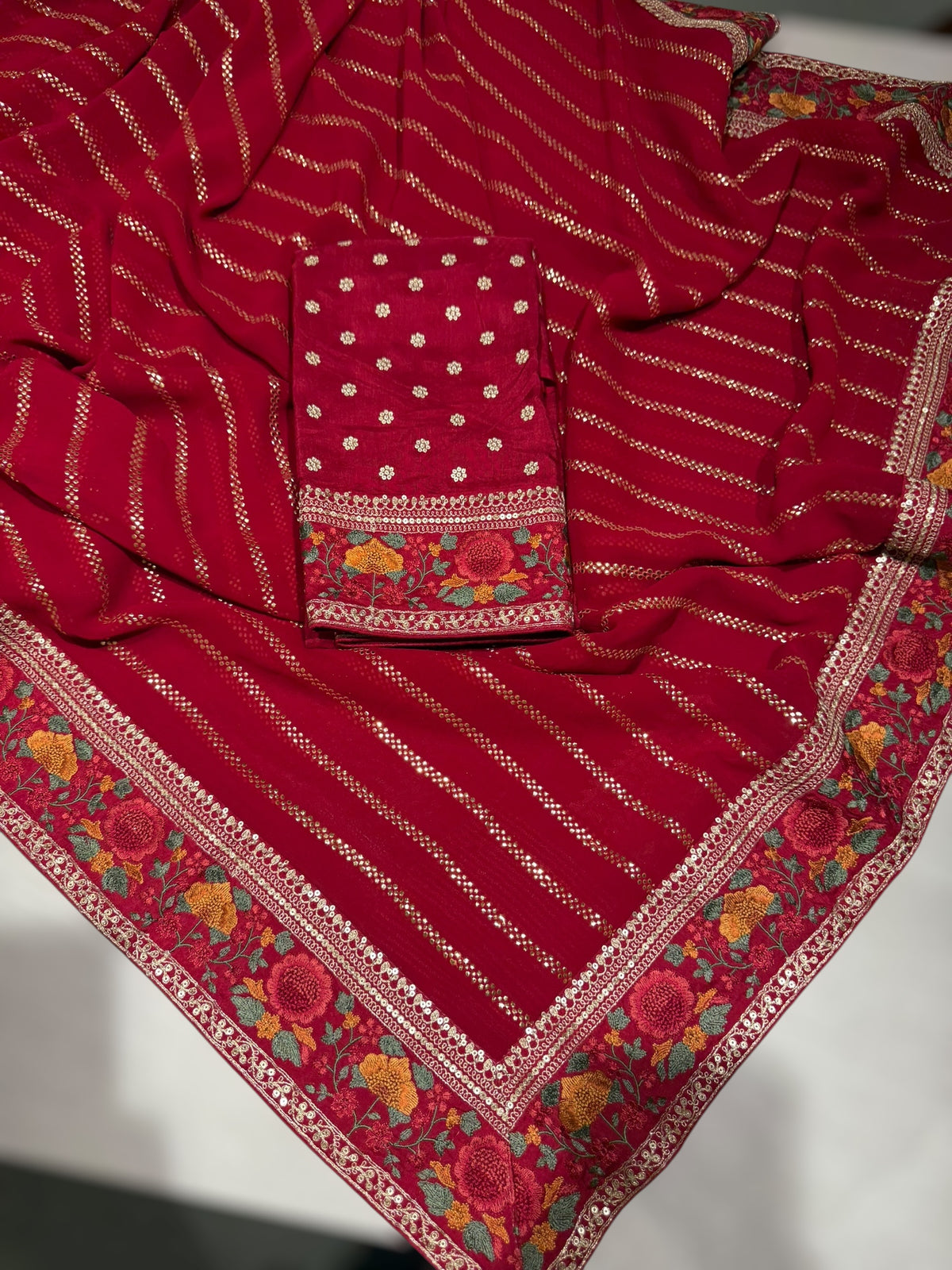 Red Georgette Saree with stick on badla with Sabyasachi borders and blouse