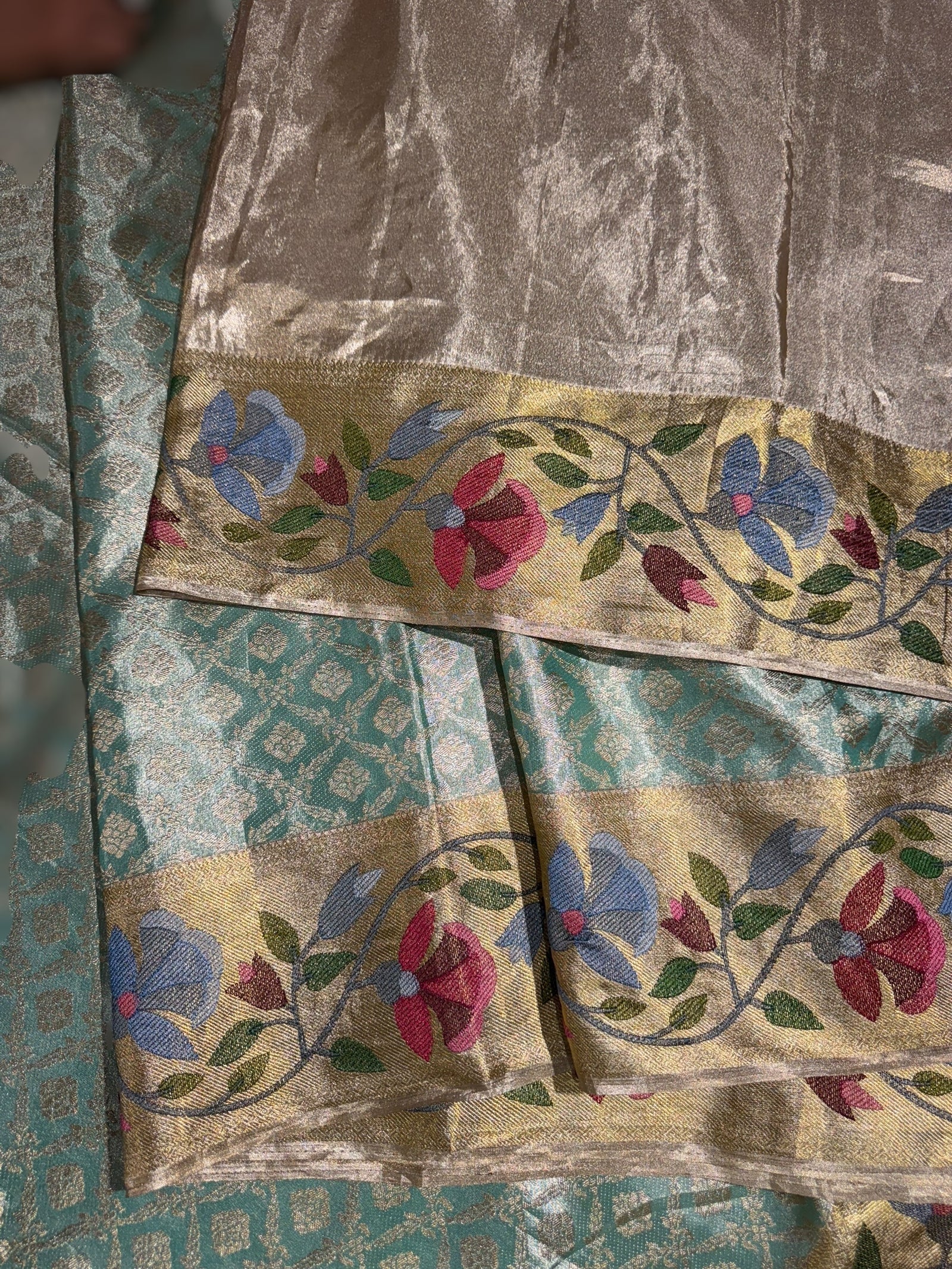 Sea Green Kanchi Tissue Brocade Saree With jamdani inspired embroidery.