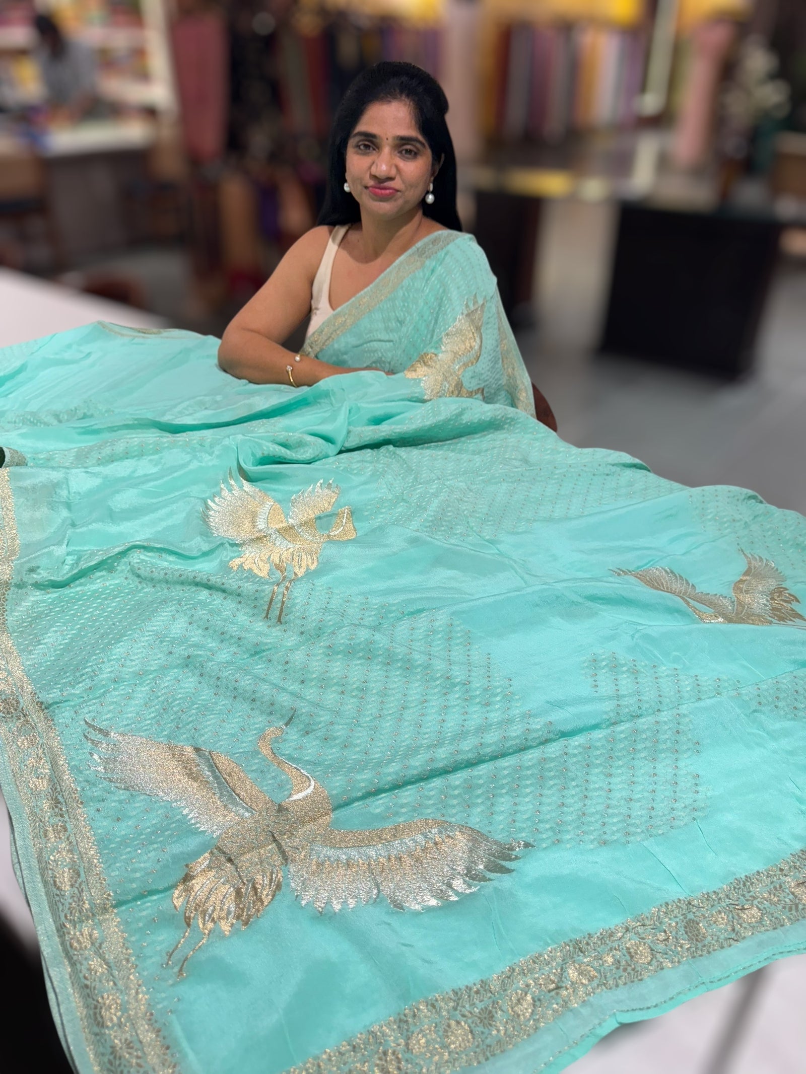 Sea blue banarasi chiffon with bird weaving