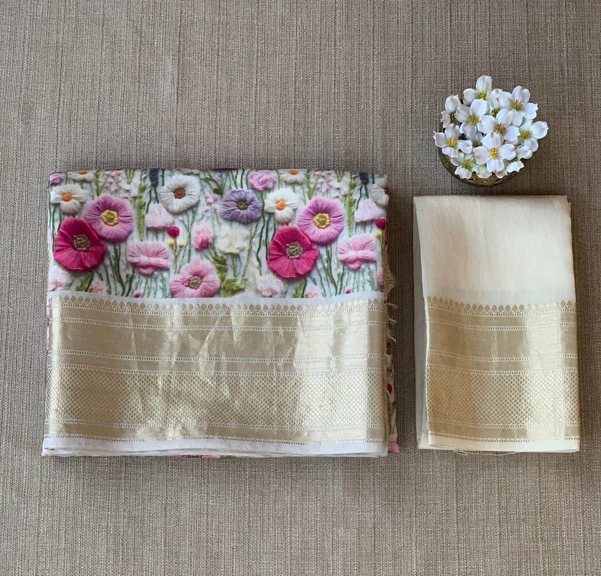 Ivory Pure Handloom Chiniya Silk Saree with stunning Floral Print and zari borders