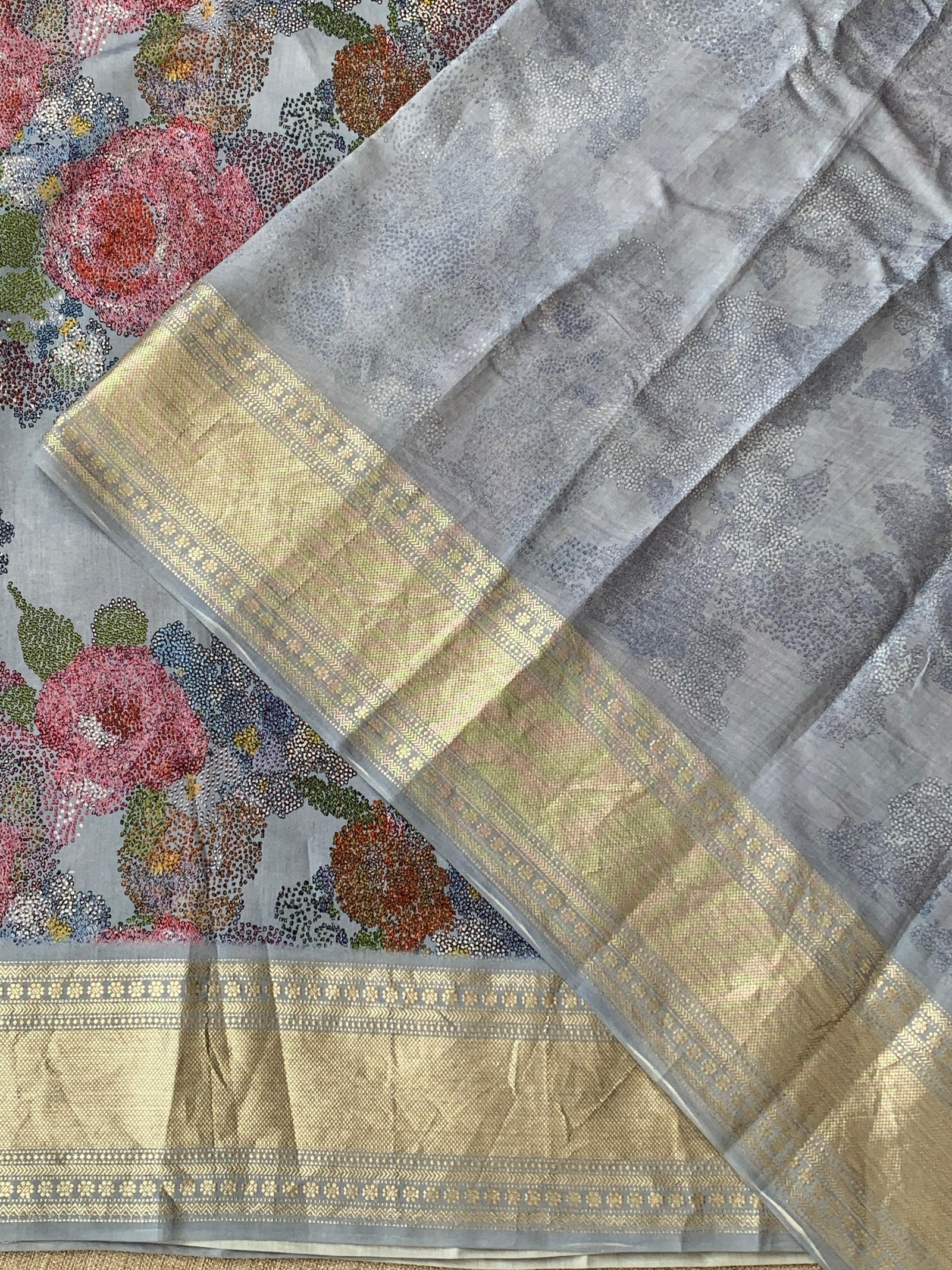 Dusty Blue Pure Handloom Chiniya Silk Saree with stunning Floral Print and zari borders