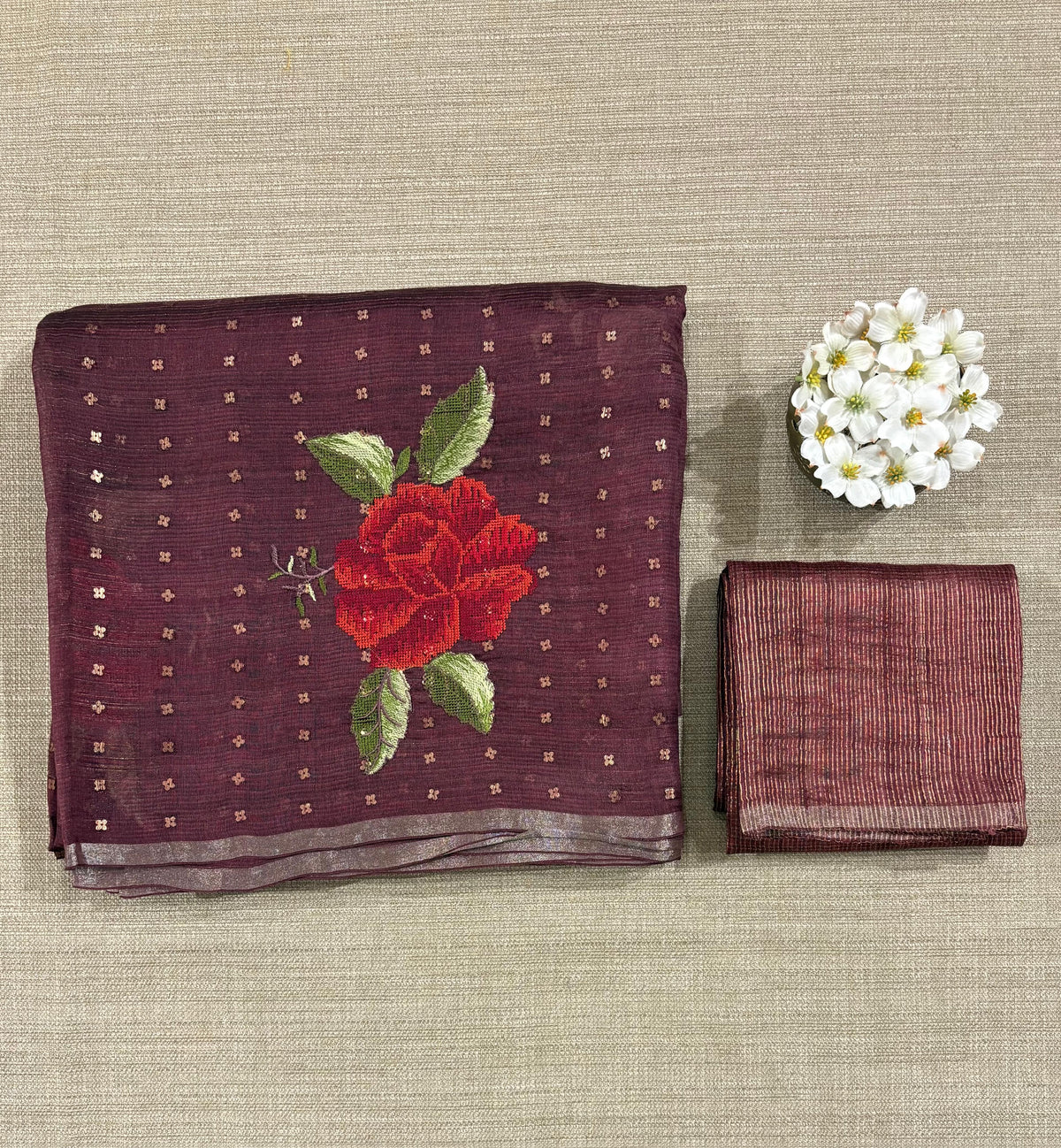 Winish brown Tussar Kota Saree with embedded sequnce and hibuscus flower embroidery