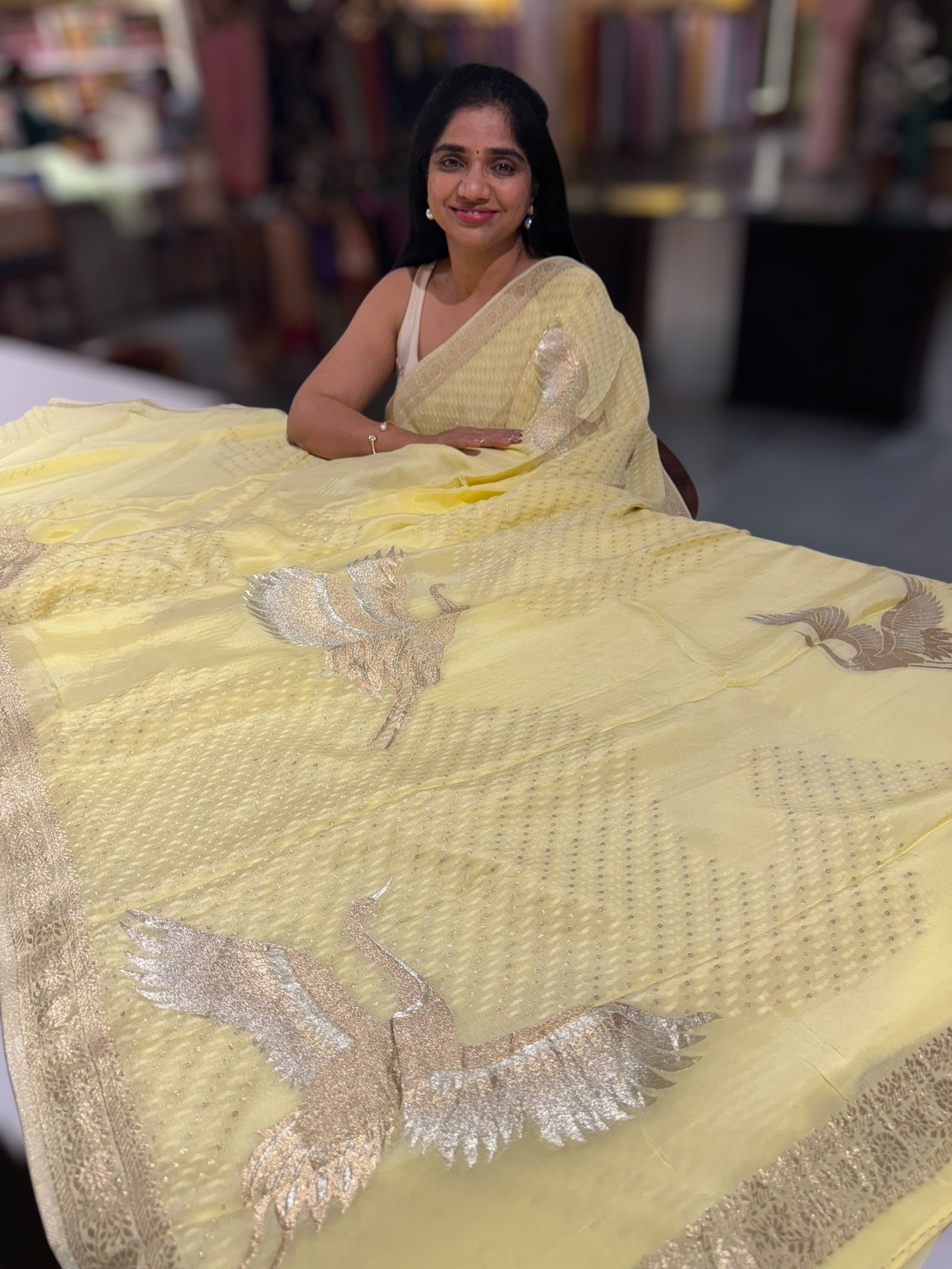 Pastel yellow banarasi chifoon  with bird weaving