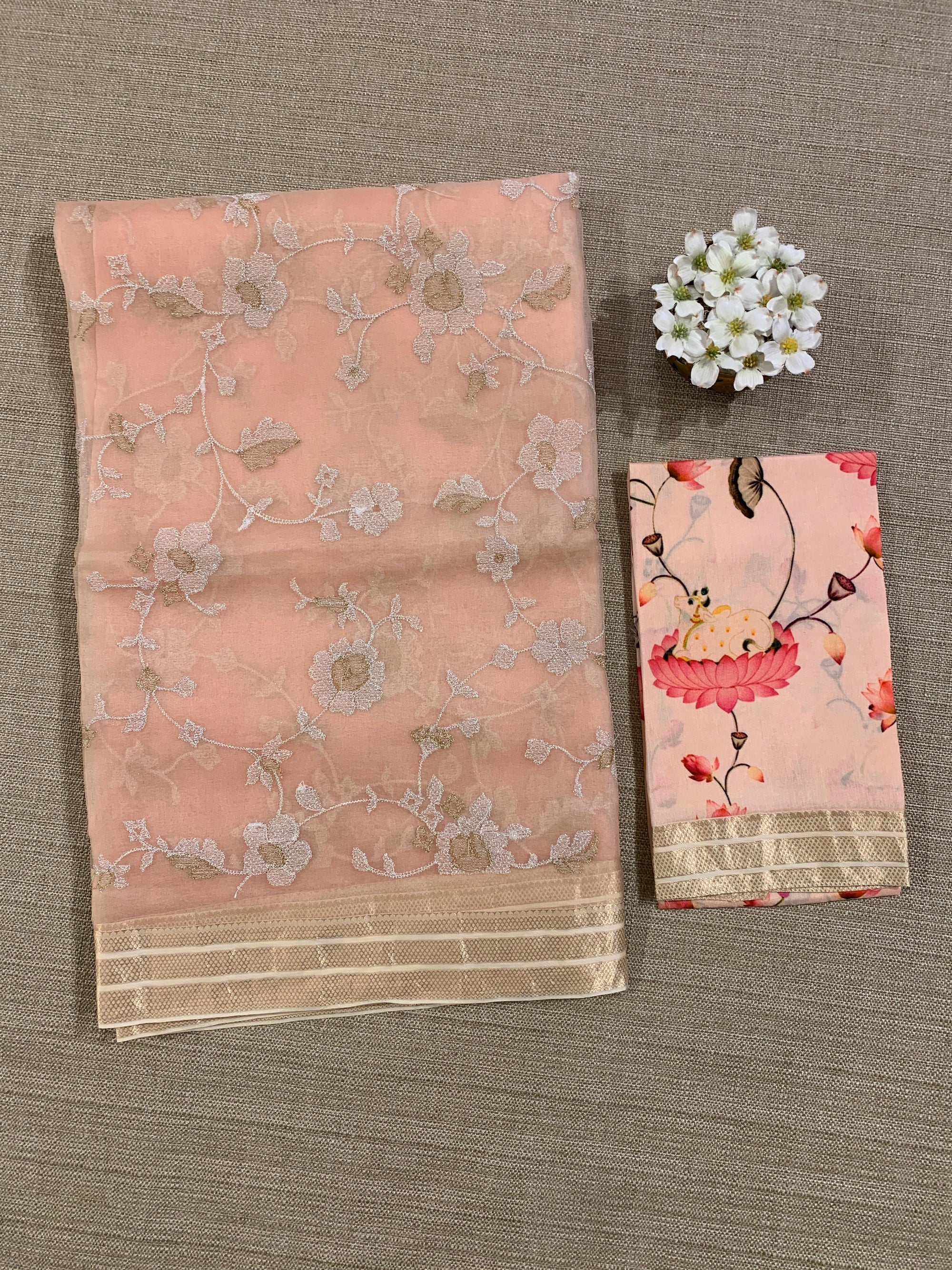 Peach Muslin allover embroidered Saree with pichwai printed blosue