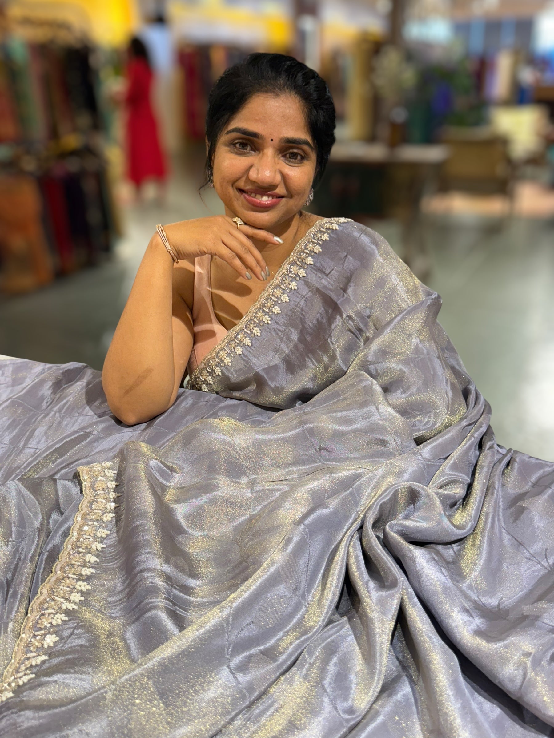 Greyish Violet Tissue Gorgette Saree With Hanwork Border and Blouse.