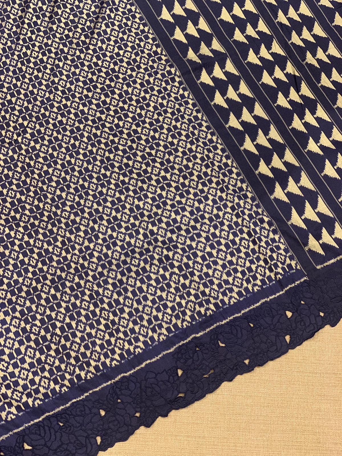 Midnight Blue Cambodian–inspired Ikkat Silk Saree with cutwork Rose Border