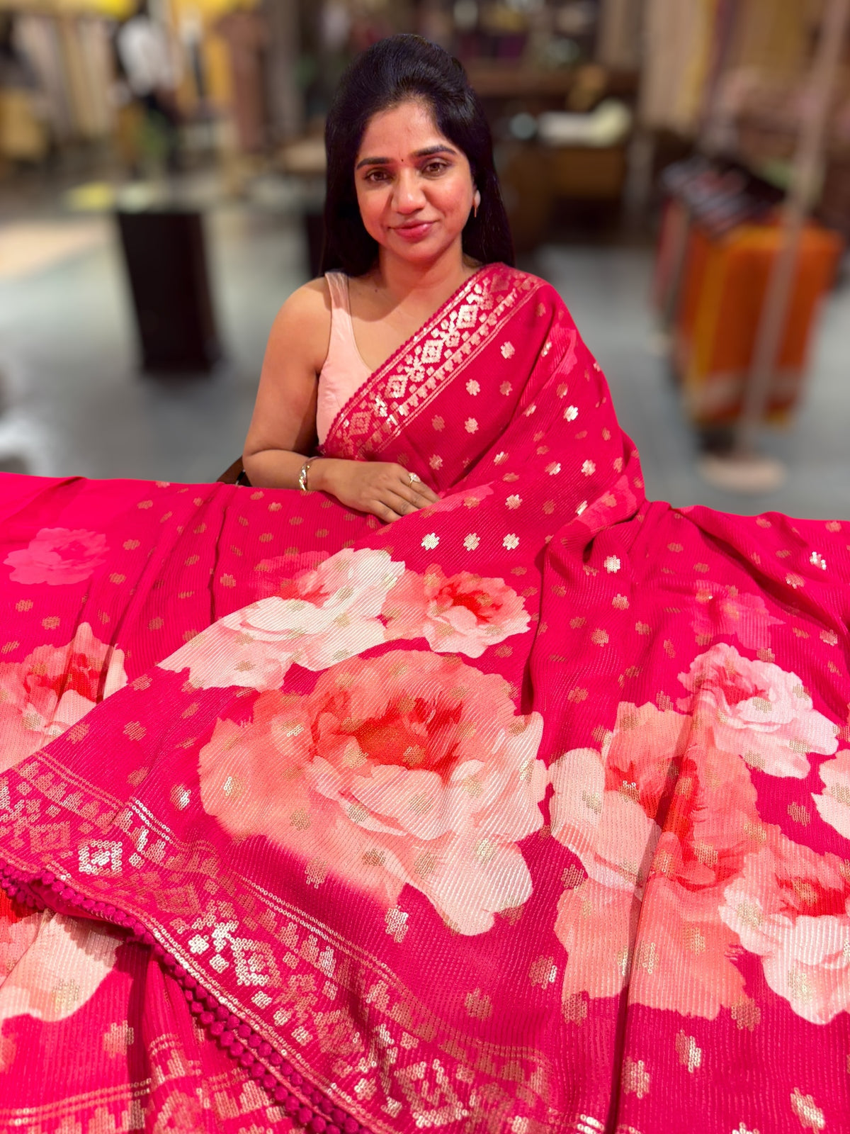 Reddish Pink georgette sequence saree with statement floral print