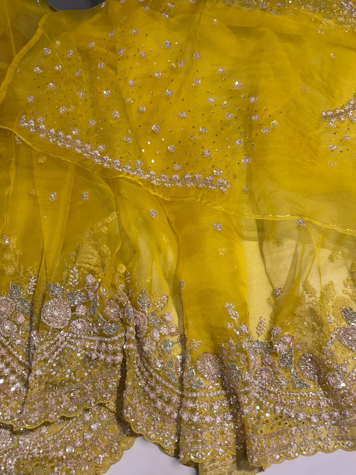 Lemon Yellow Organza Silk Saree with heavy intricate handwork