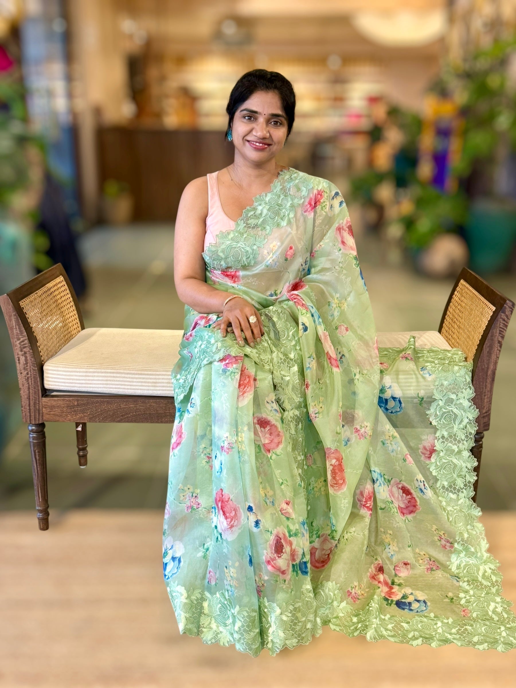 Mint Floral Printed Organza Saree With Chantilly Lace Style Embroidered Border.