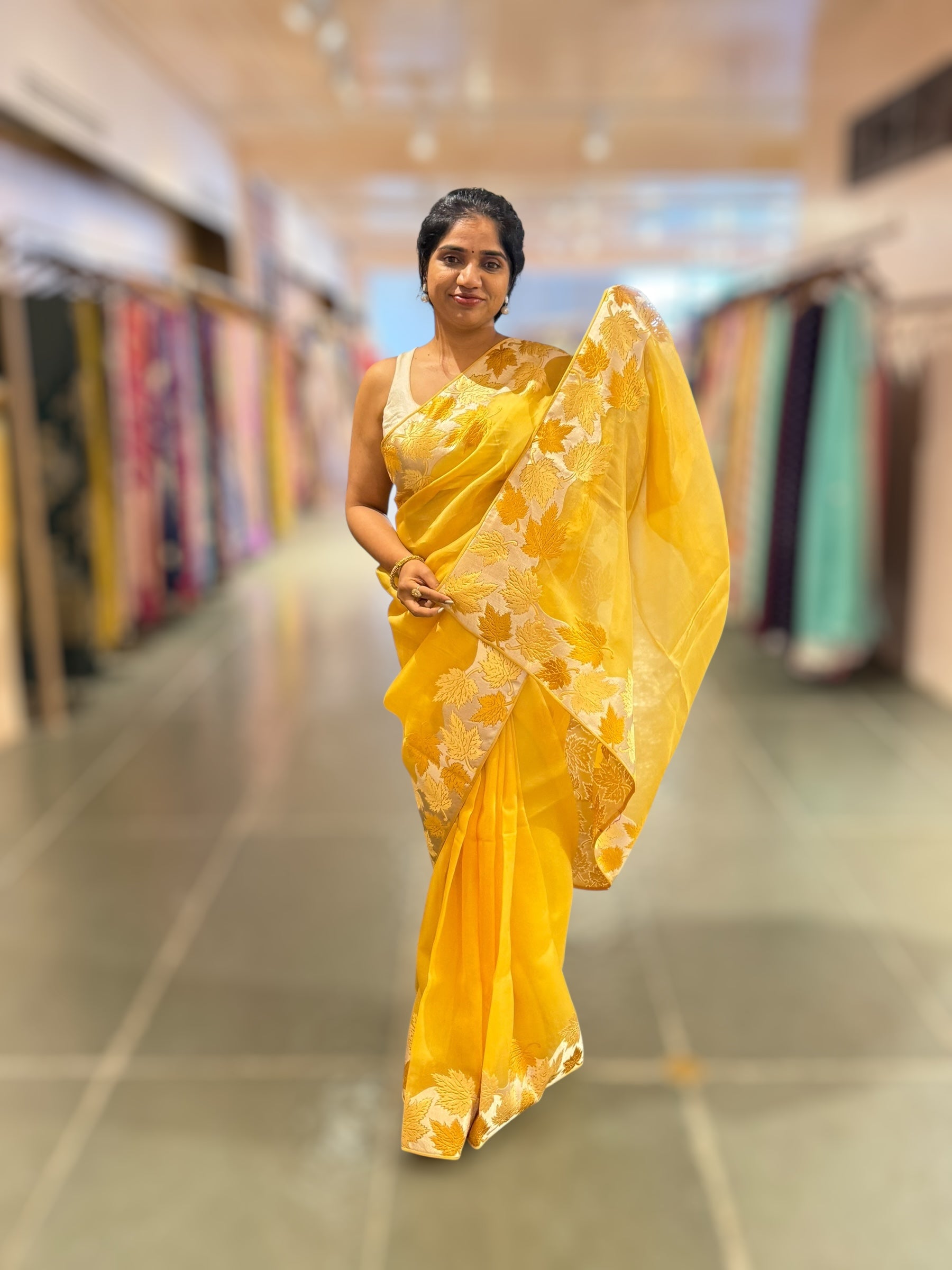 Yellow Organza Saree with Stunning Leaf Embroidered Border