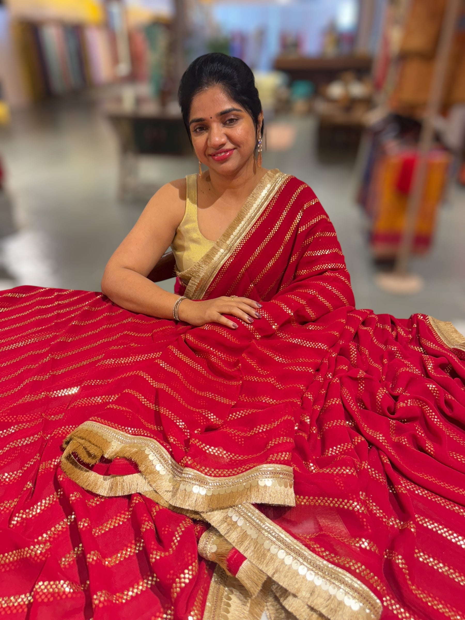 Dark Red Georgette Saree with stick on Badla in stripes pattern and kiran Lace