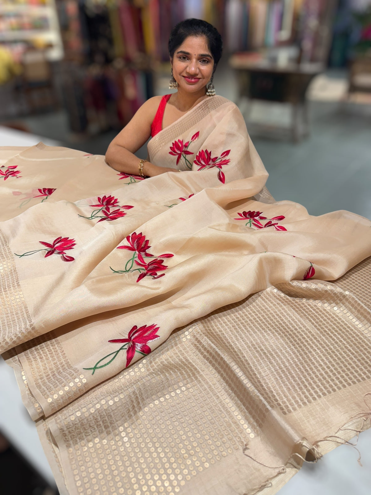 Ivory pure handloom tussar byloom saree with lotus embroidered bunch motifs