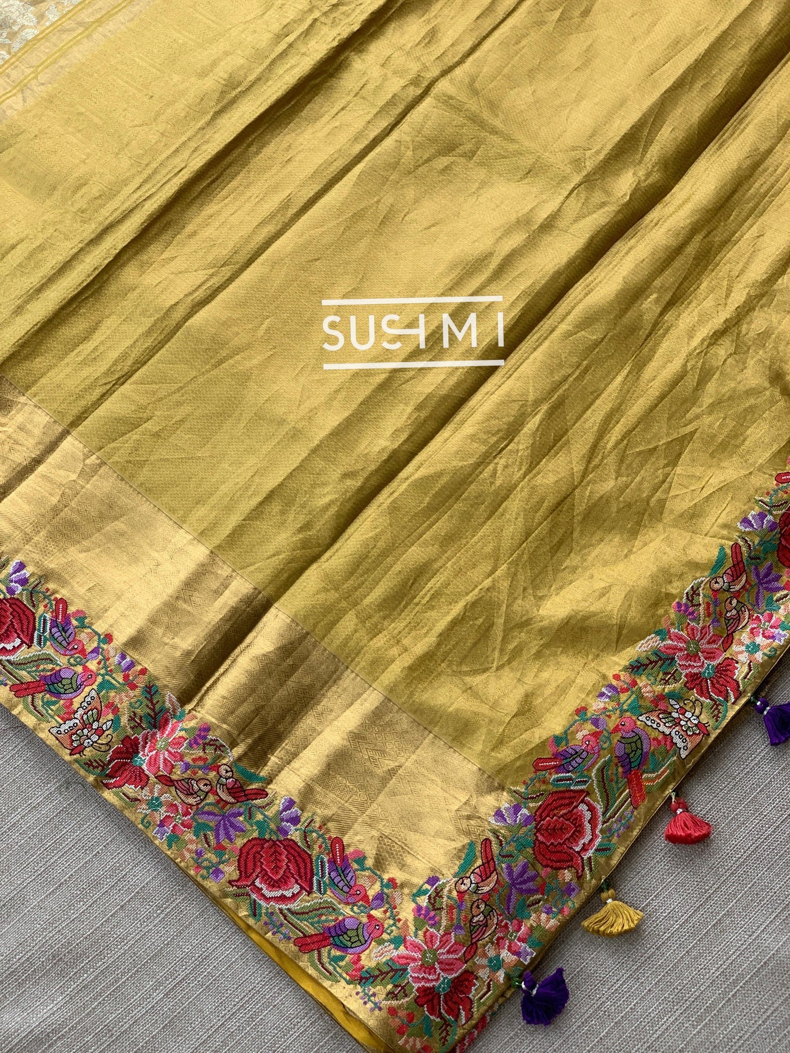 Molten Gold Kanjeevaram Tissue Sareewith petite point embroidery : S62F089