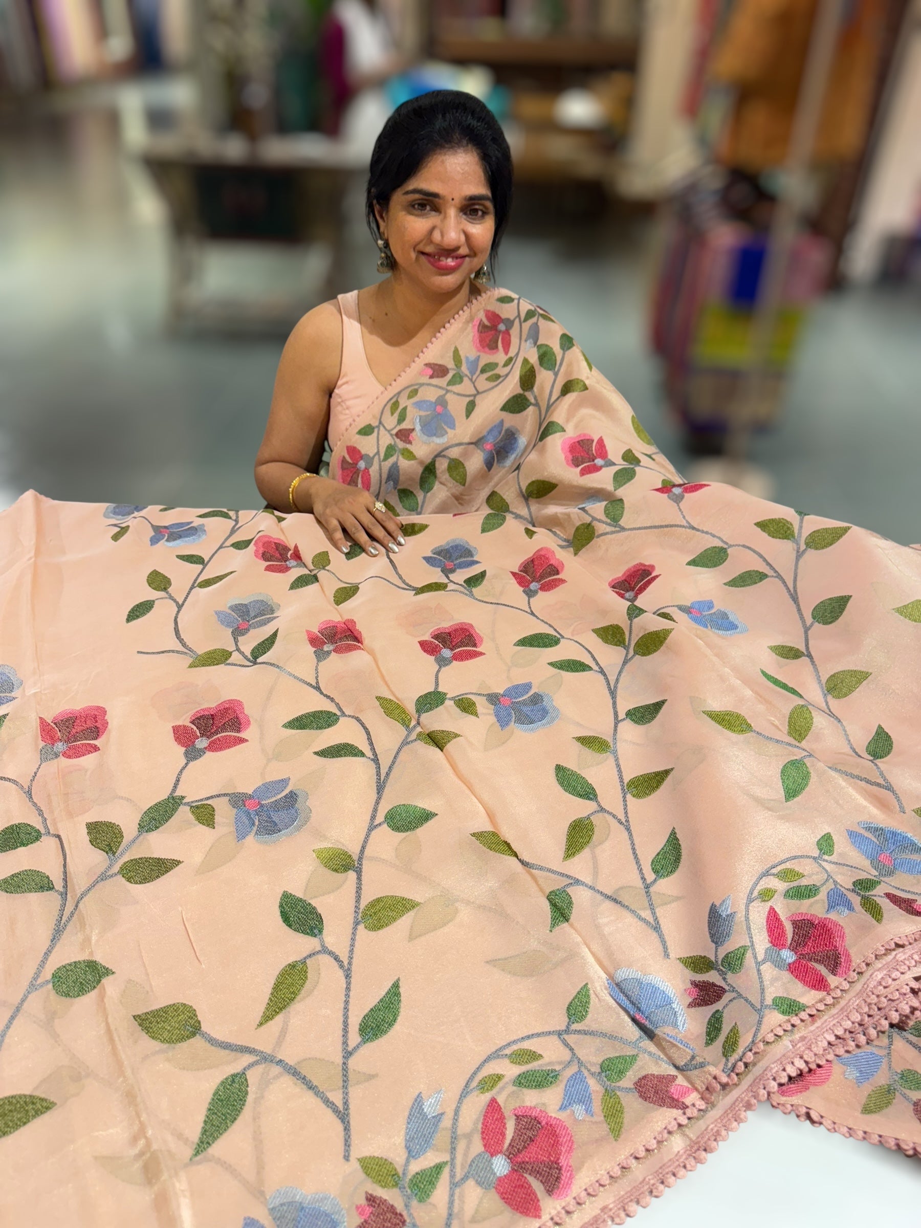 Peach Tissue georgette saree with allover jamdani inspired embroidery