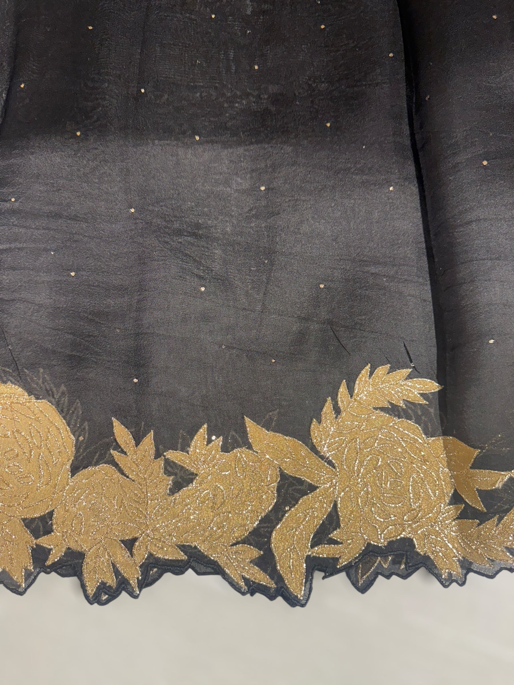 Black Organza Saree with Mukaish work and tissue floral applique cutwork border