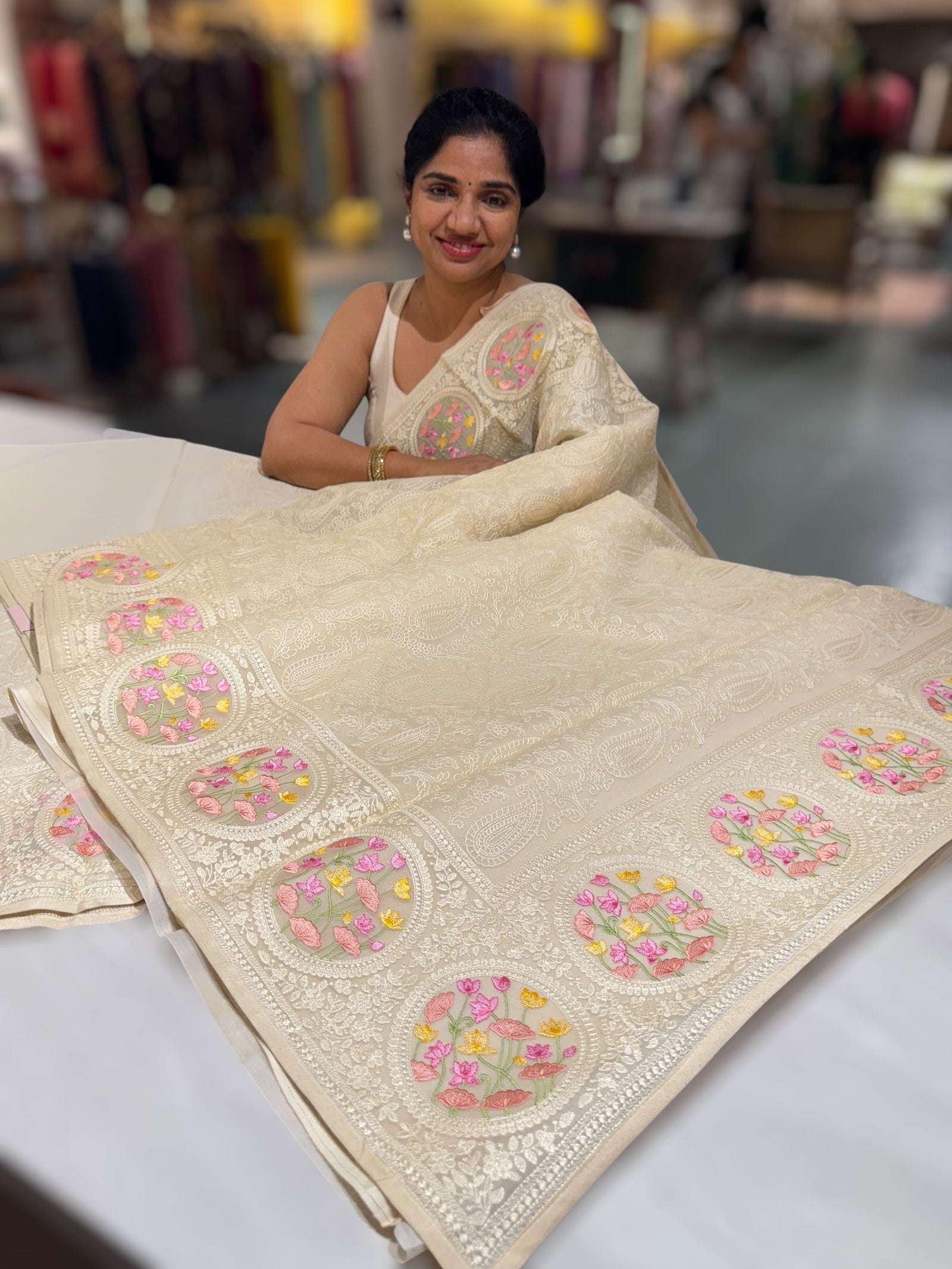 Ivory Organza Saree with allover Chikankari Embroidery and pichwai border