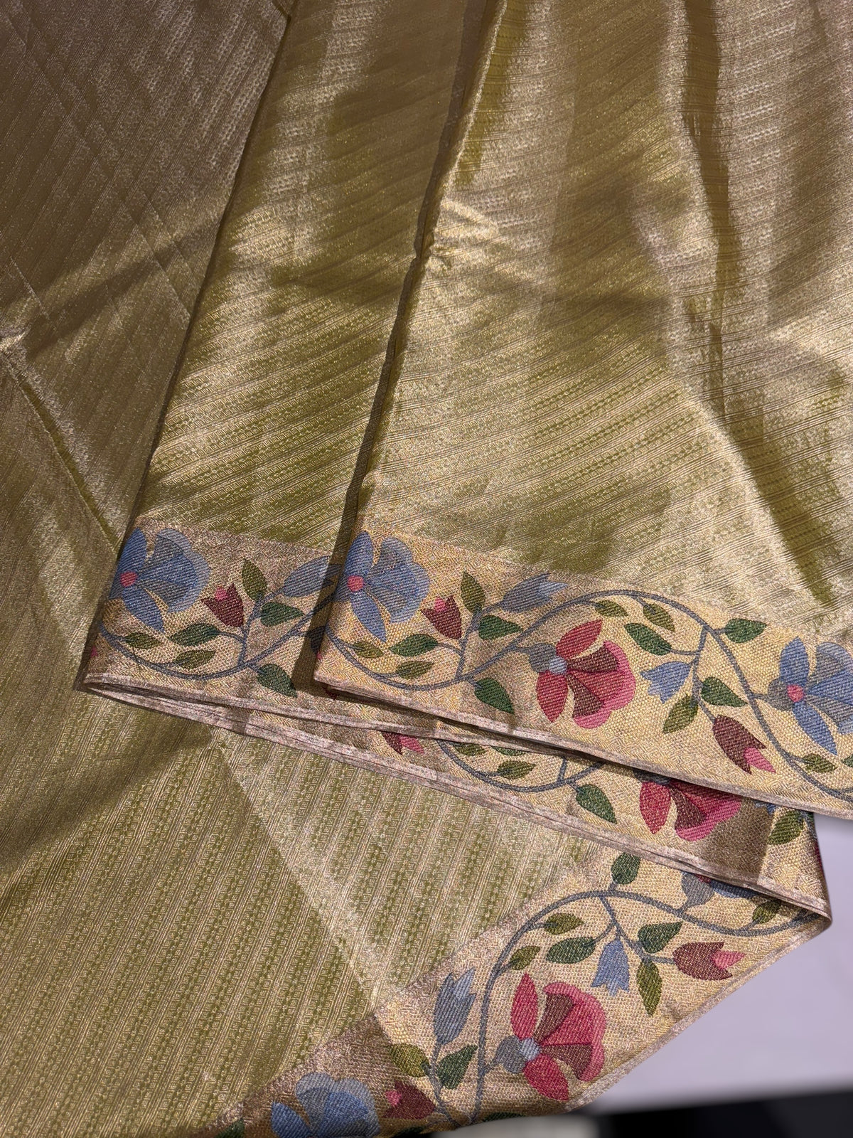 Apple Green Kanchi Tissue Brocade Saree With jamdani inspired embroidery.