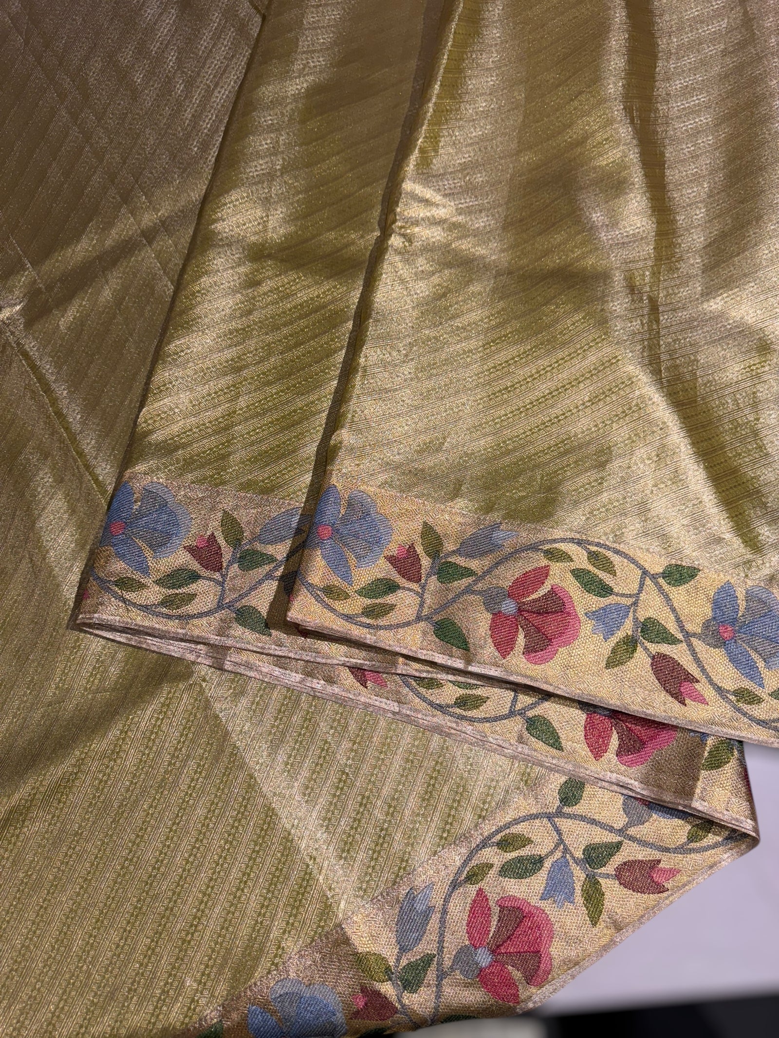 Apple Green Kanchi Tissue Brocade Saree With jamdani inspired embroidery.