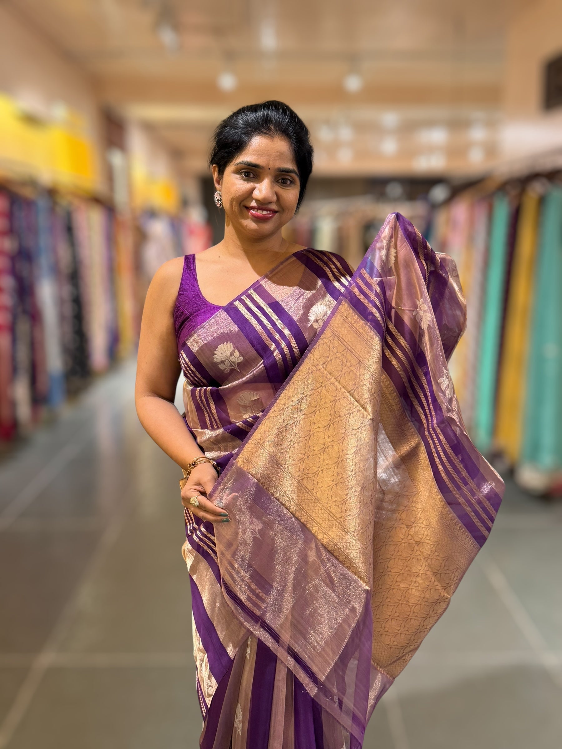 Purple Banarasi Handloom Kora Tissue Stripes with allover kaduwa woven lotus  motifs .