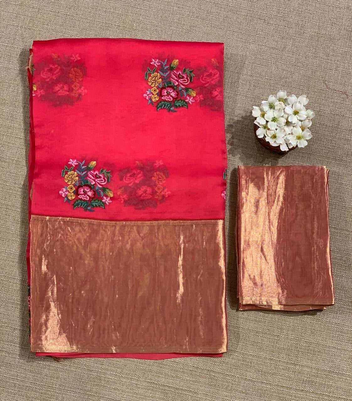 Pinkish Red Organza Saree with pure Tissue Border