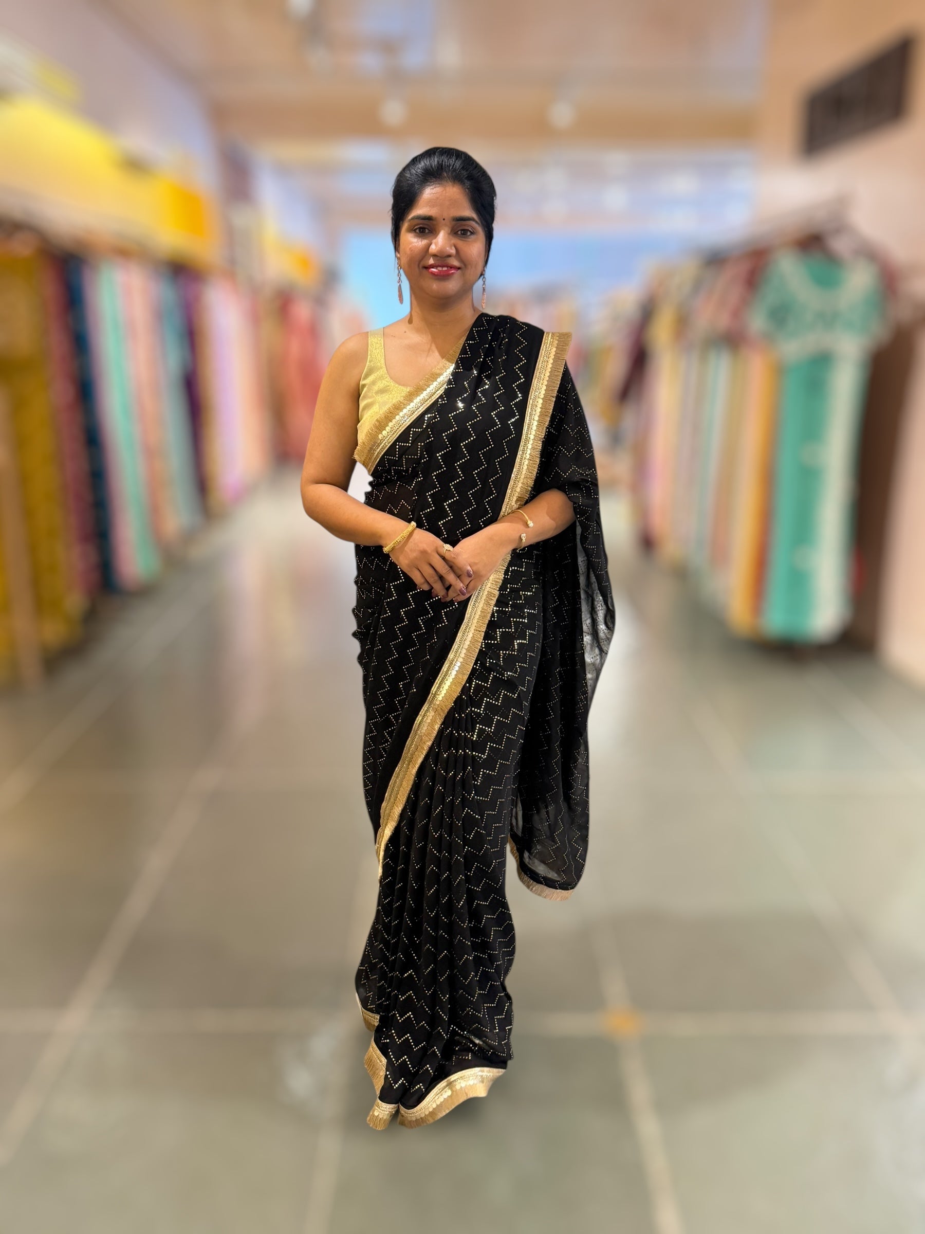 Black Georgette Saree with stick on Badla in zigzag pattern