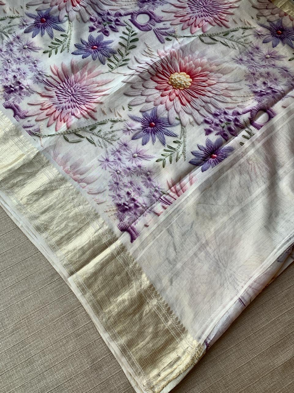 Ivory Pure Handloom Chiniya Silk Saree with stunning Floral Print and zari borders