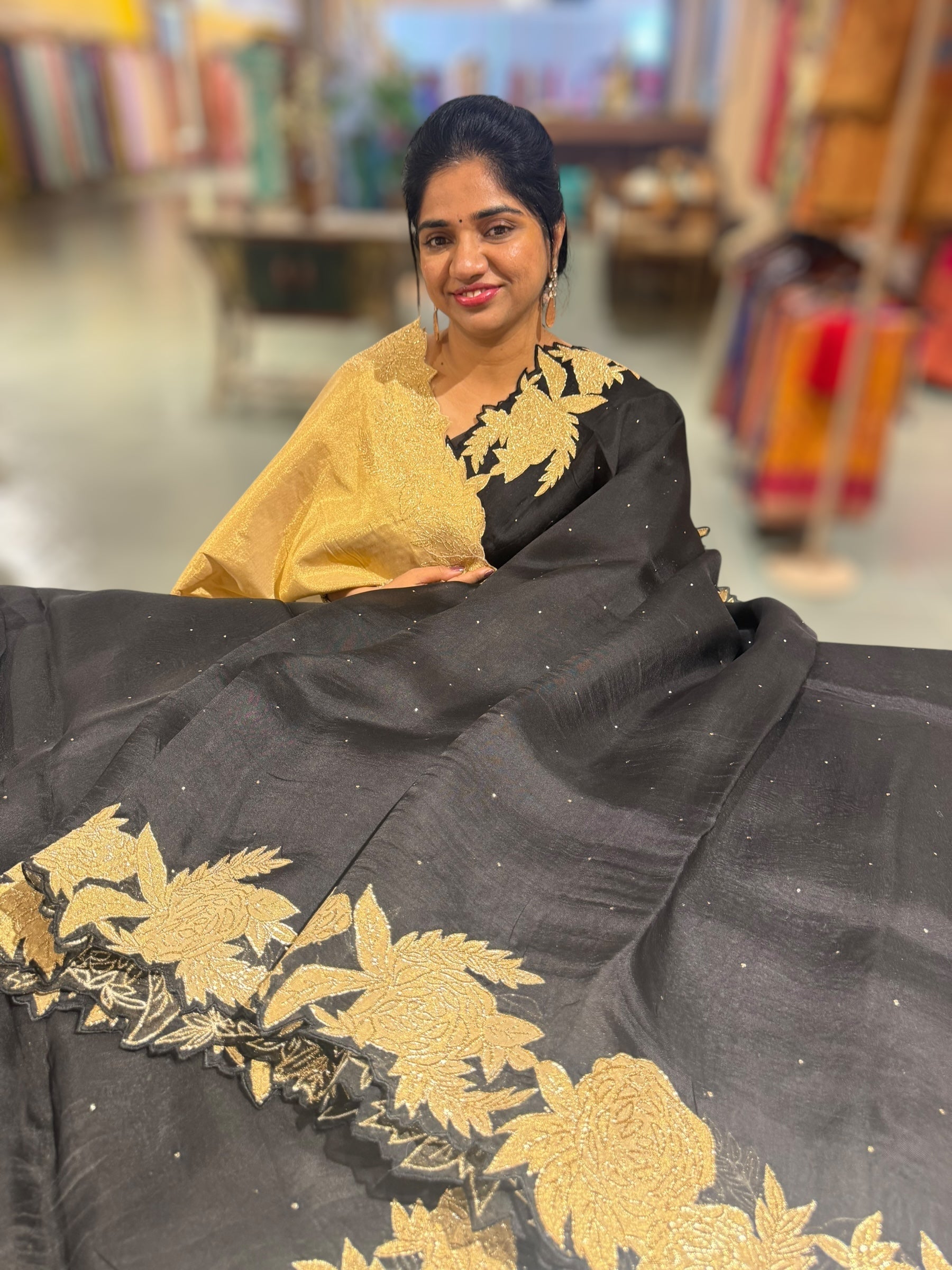 Black Organza Saree with Mukaish work and tissue floral applique cutwork border