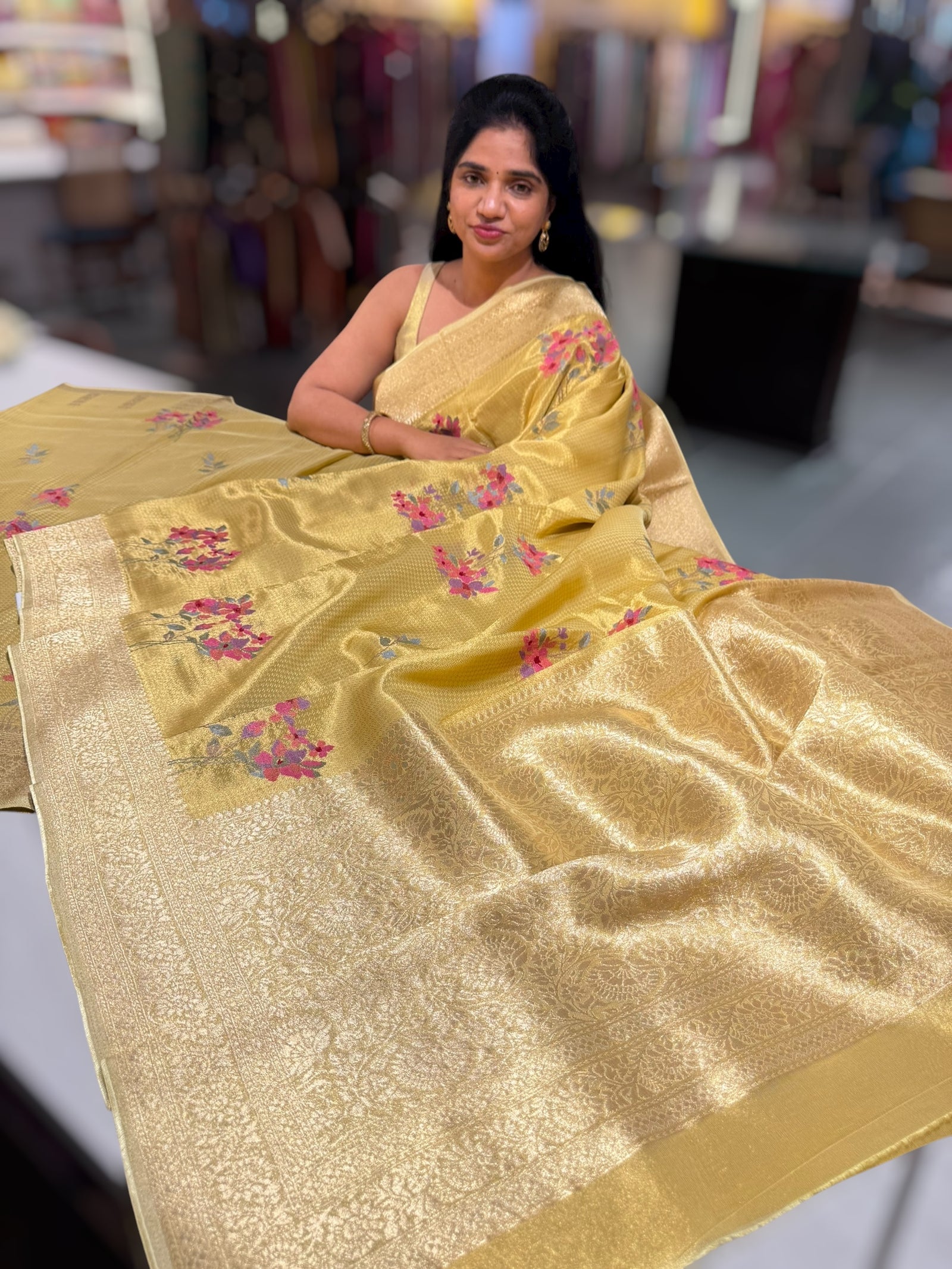 Pastel yellow Fancy Banarasi tissue tonchoi weaving saree with embroidery