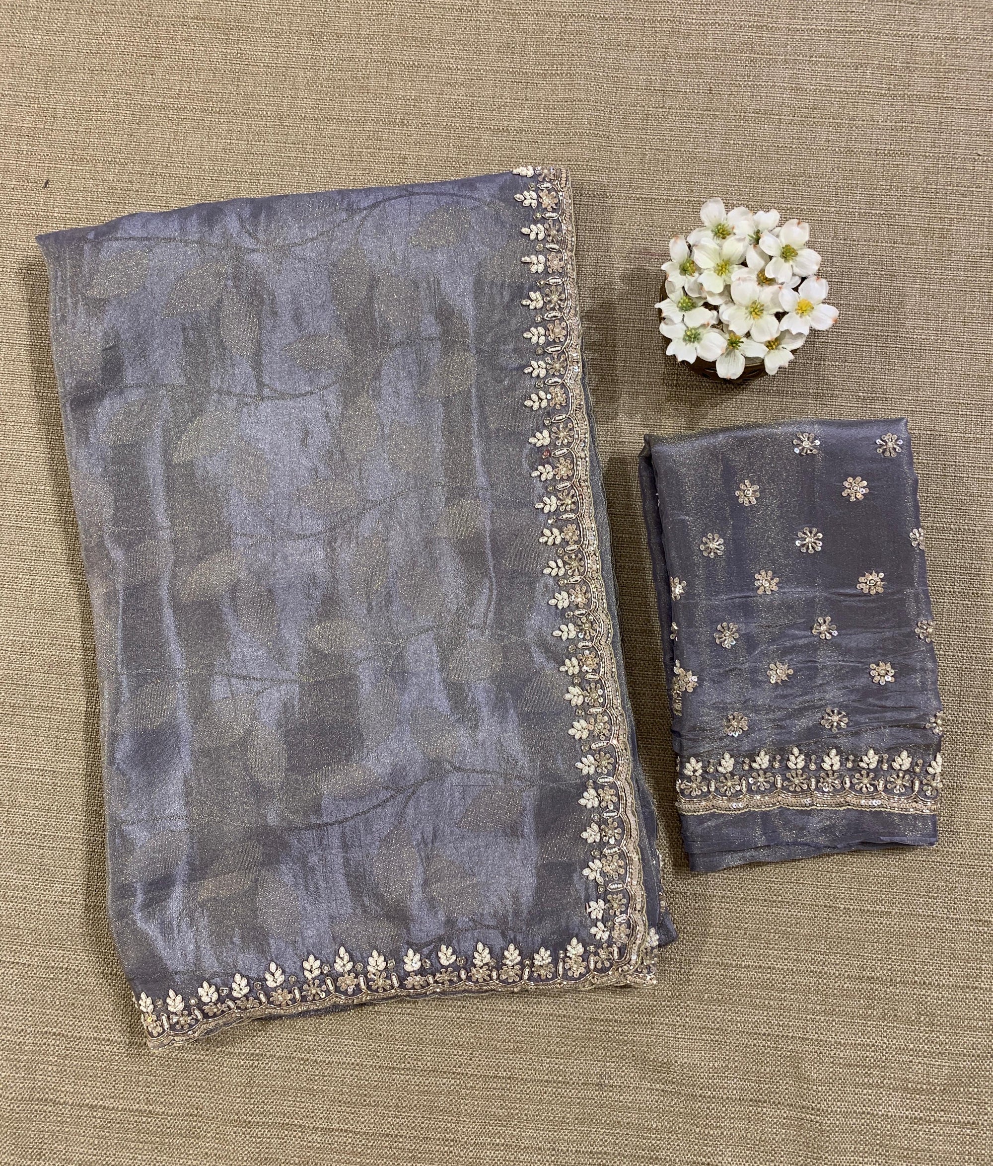 Greyish Violet Tissue Gorgette Saree With Hanwork Border and Blouse.