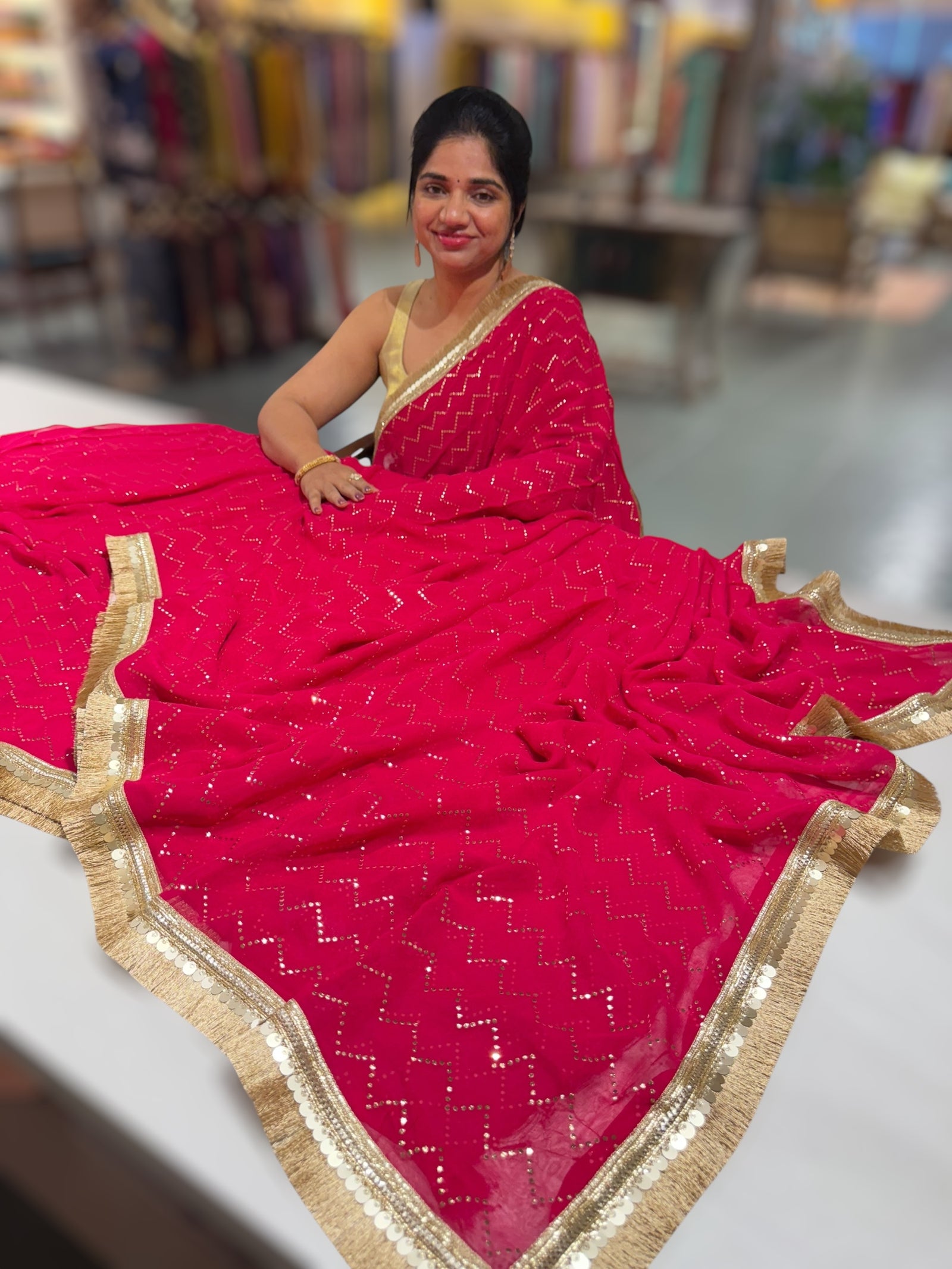 Dark Pink Georgette Saree with stick on Badla in zigzag pattern