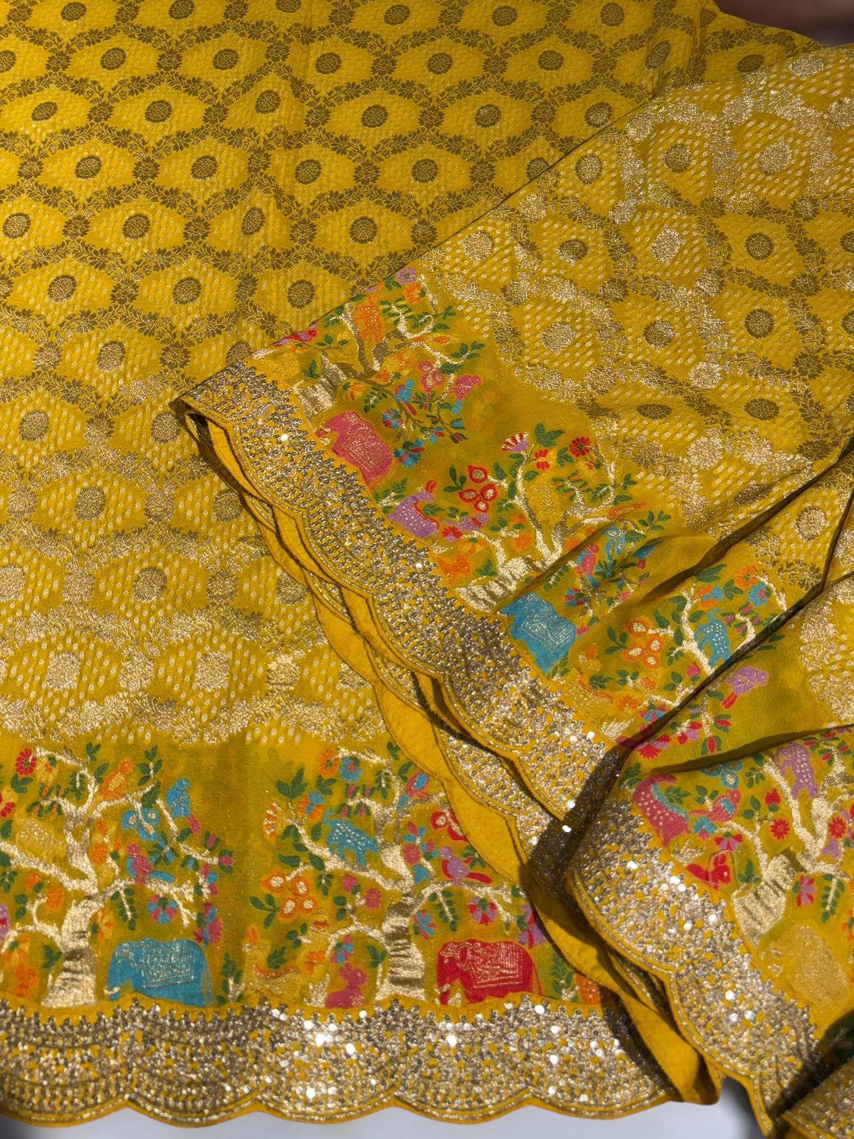Yellow Bandhini Georgette Saree with sabya style scallop border