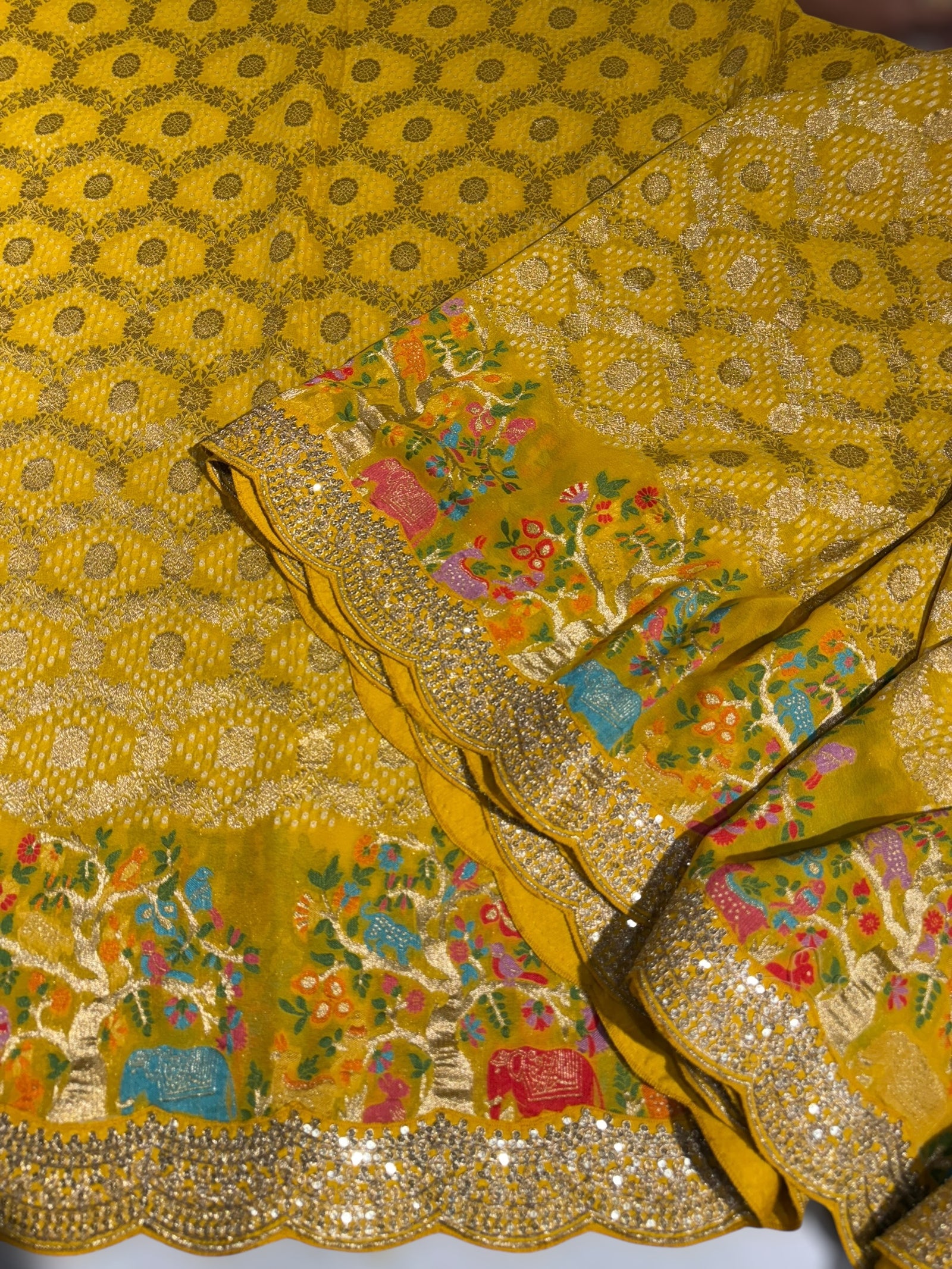 Yellow Bandhini Georgette Saree with sabya style scallop border