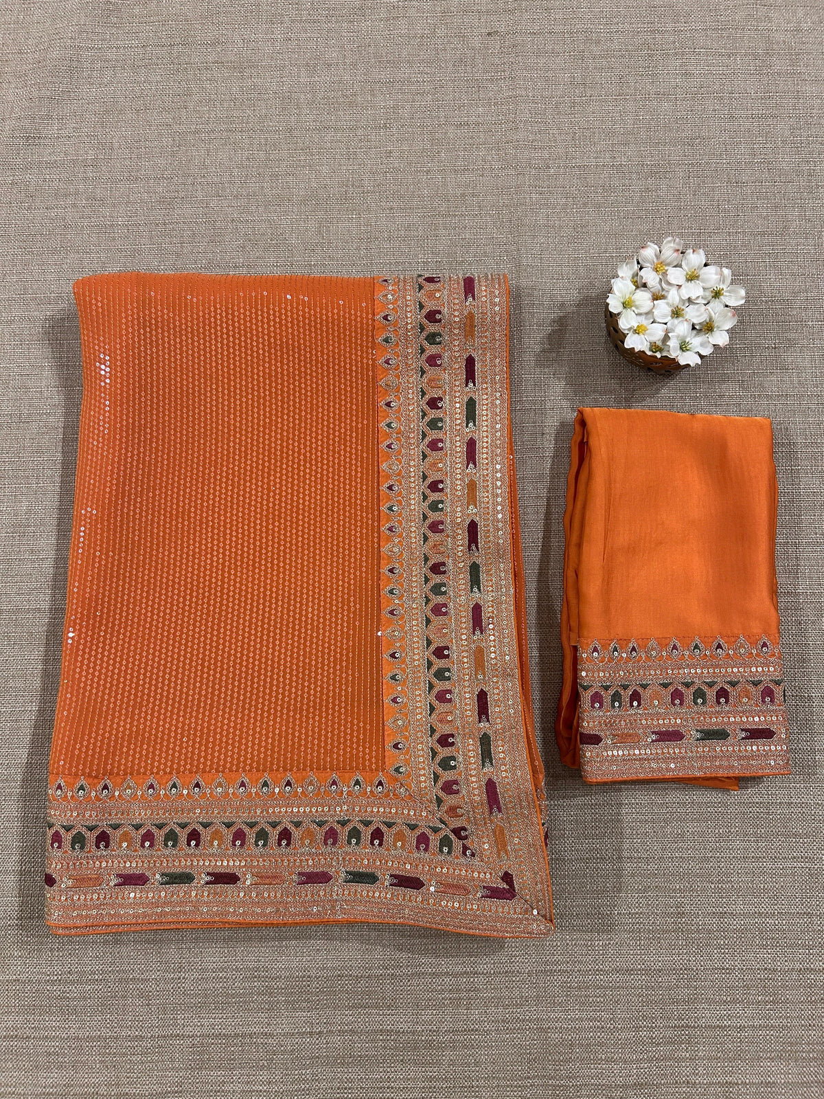 Orange Georgette sequnce Saree with Sabyasachi borders