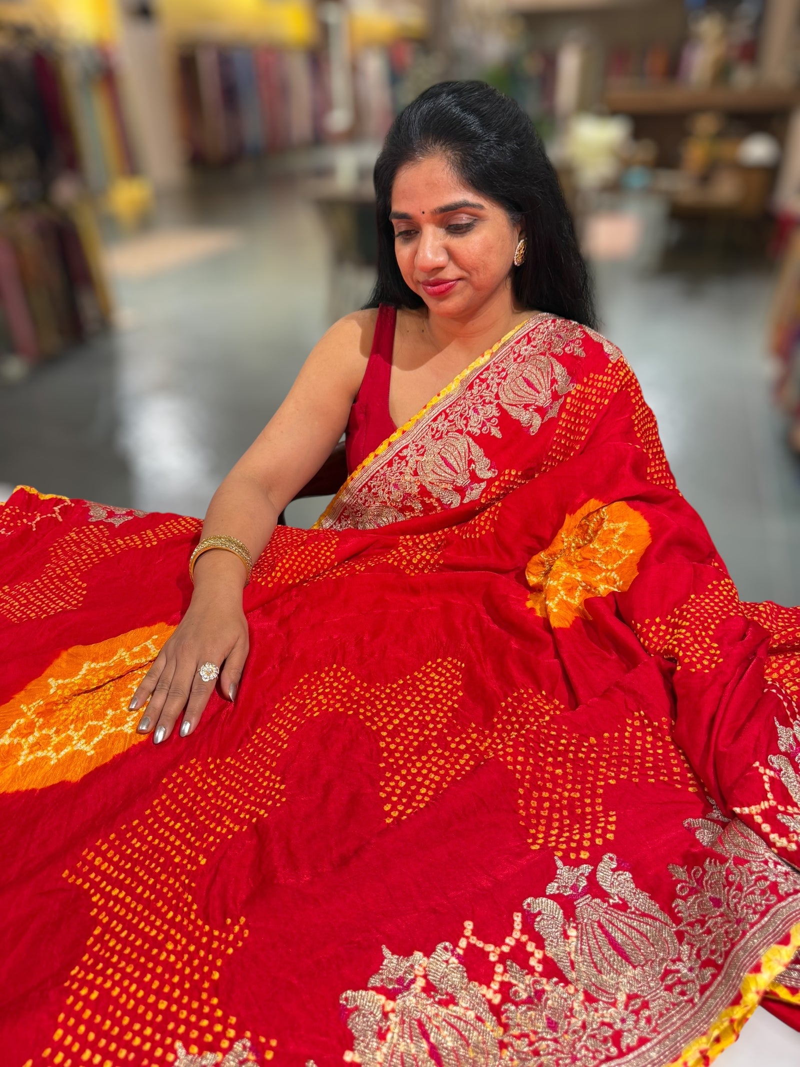 Orangish Red Designer Rai Bandhej Saree With Embroidered Border