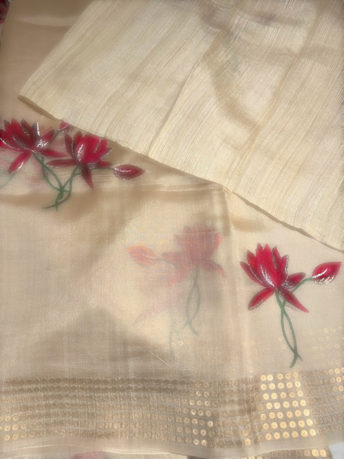 Ivory pure handloom tussar byloom saree with lotus embroidered bunch motifs