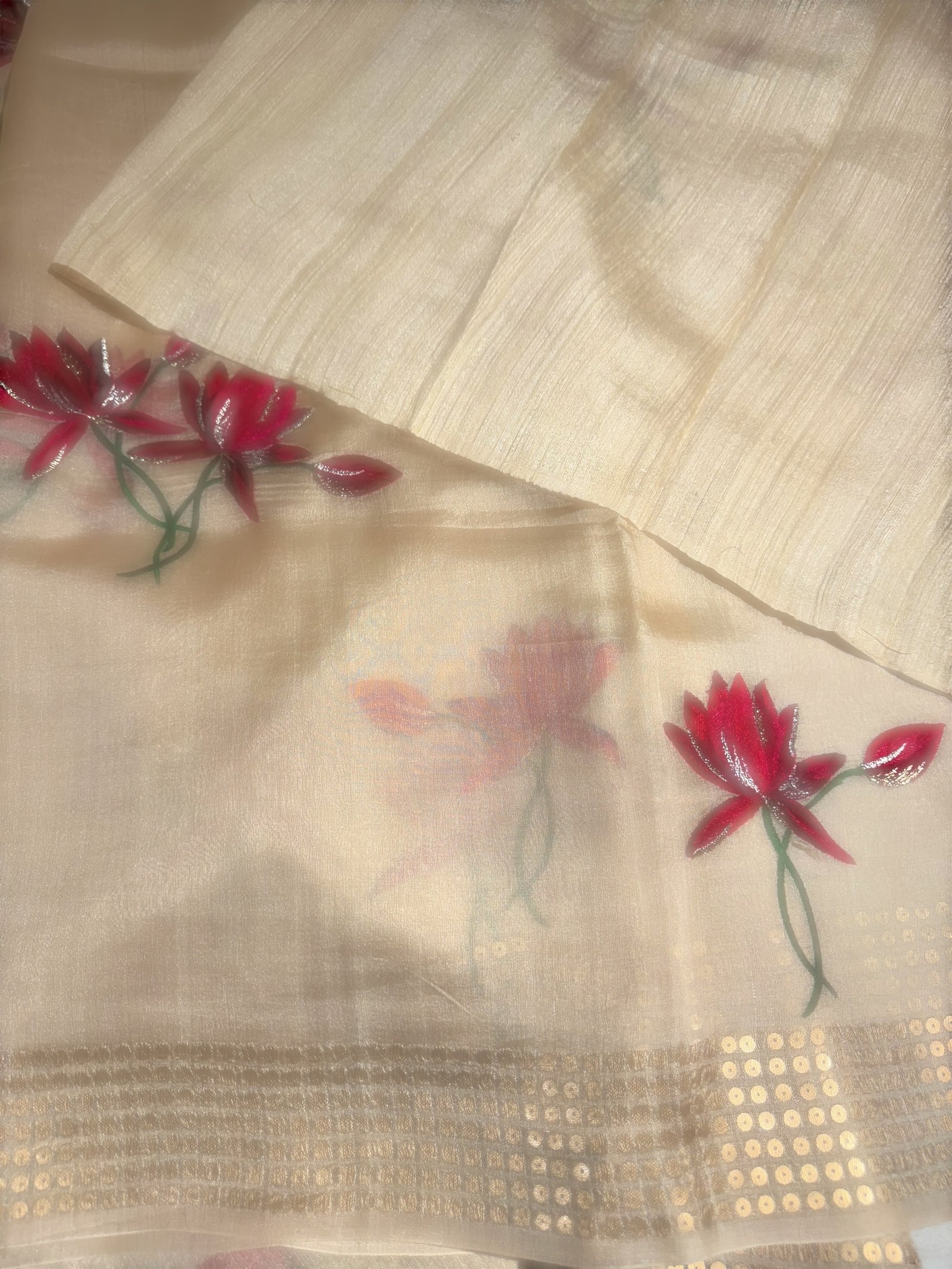 Ivory pure handloom tussar byloom saree with lotus embroidered bunch motifs