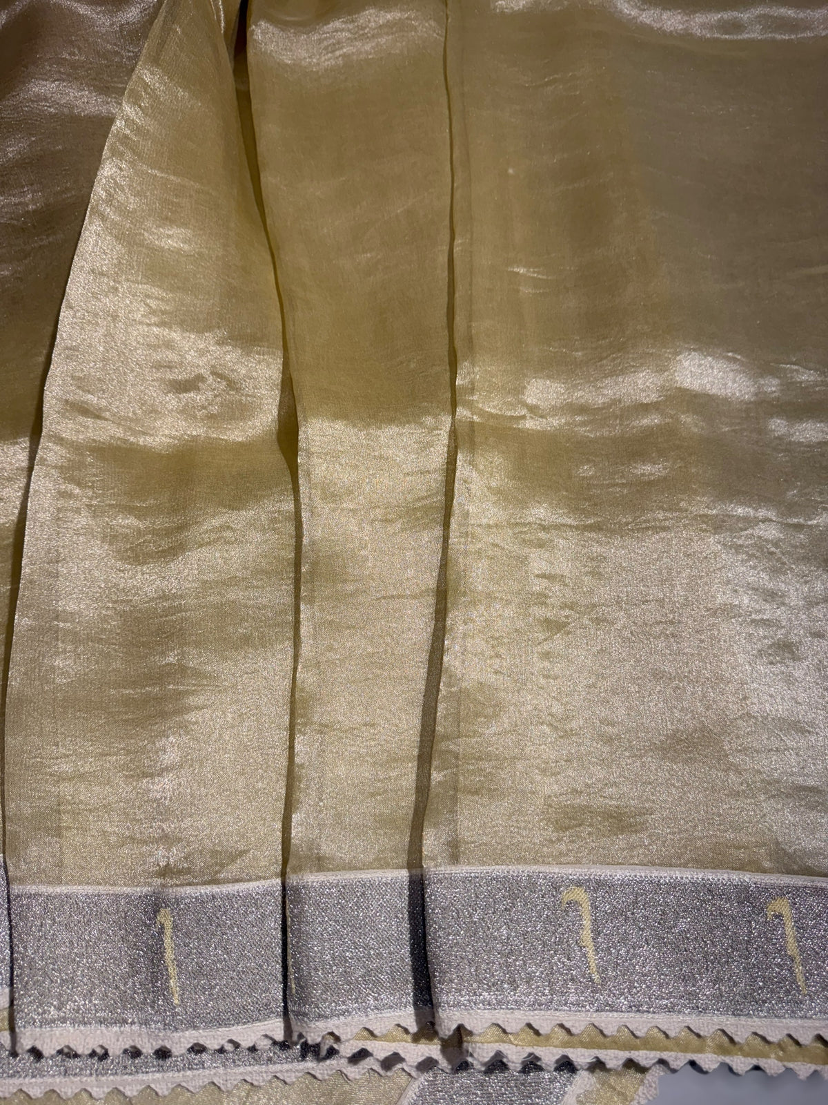 Pastel yellow Tissue Saree with pythani tissue embroidered border