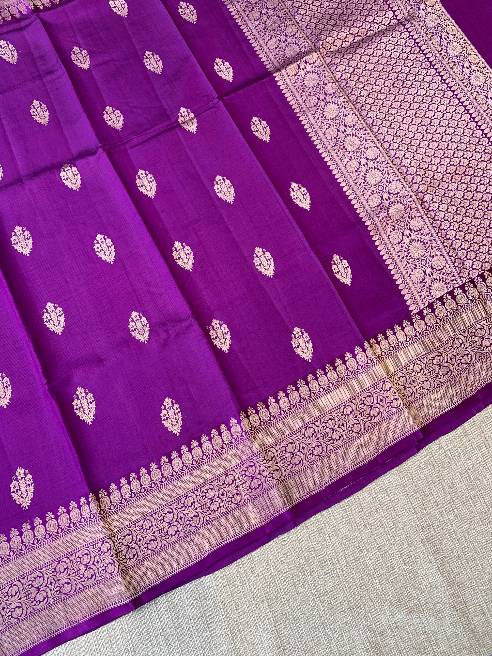Brinjal Raw Mangoe Silk Saree in Monotone Look with heavy weaving Mashru borders & kaduwa woven motifs.