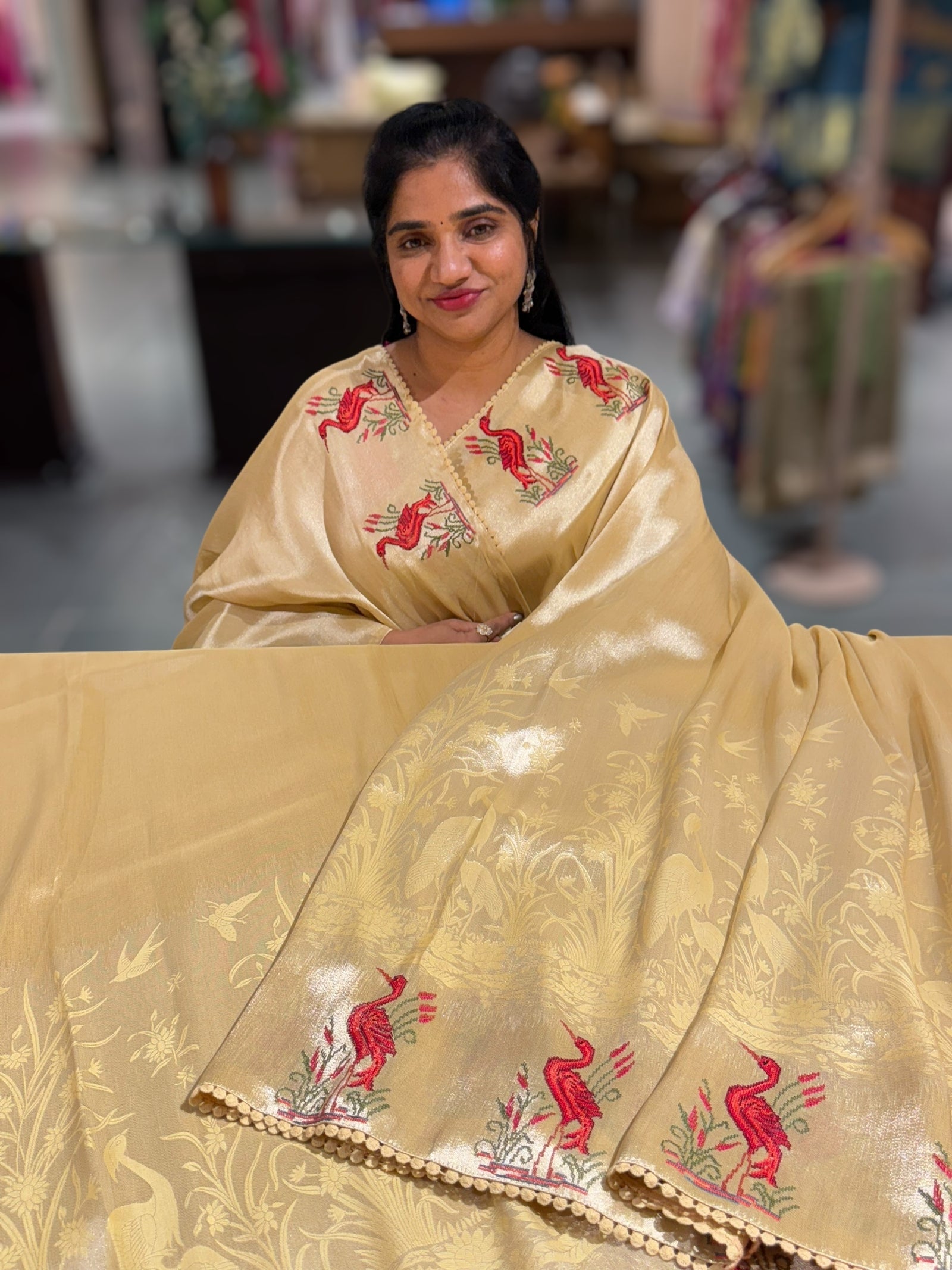 Pastel yellow Banarasi Brocade tissue saree with tonchui style weaving & petite point embroidered swan border