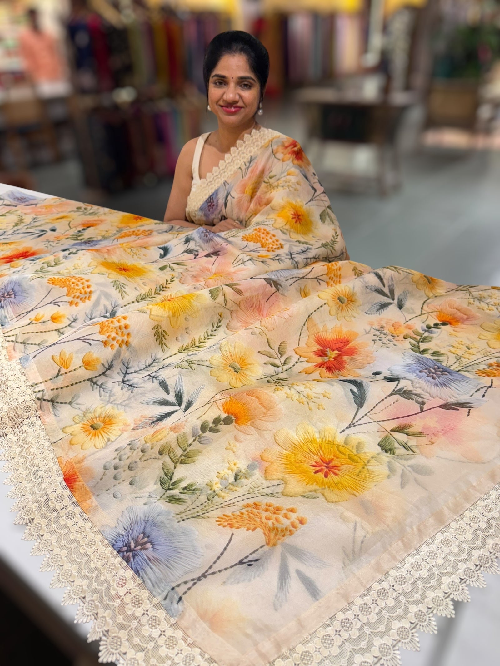 Beige Organza 3D floral Printed Saree hemlined with crotia lace
