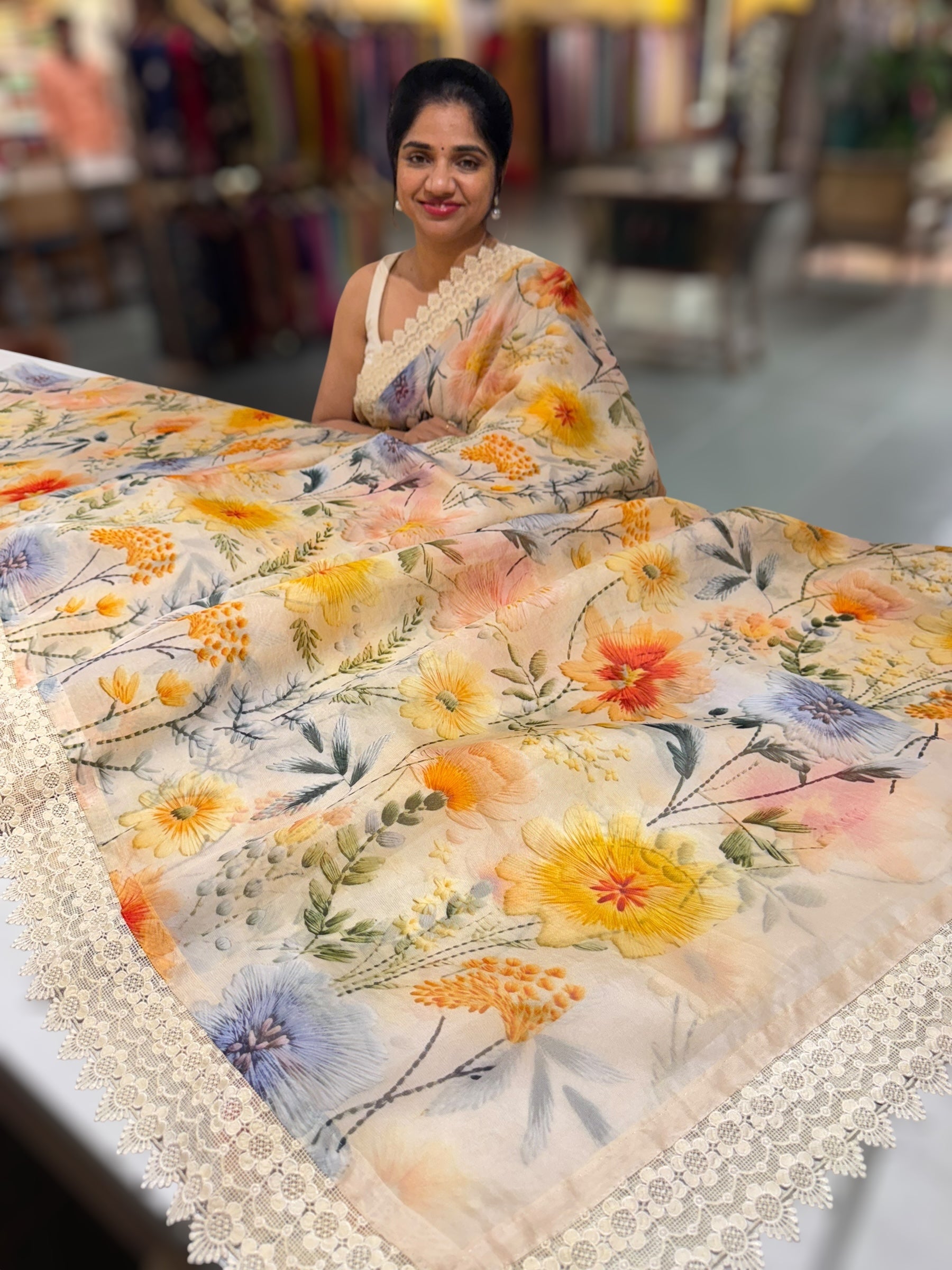 Beige Organza 3D floral Printed Saree hemlined with crotia lace