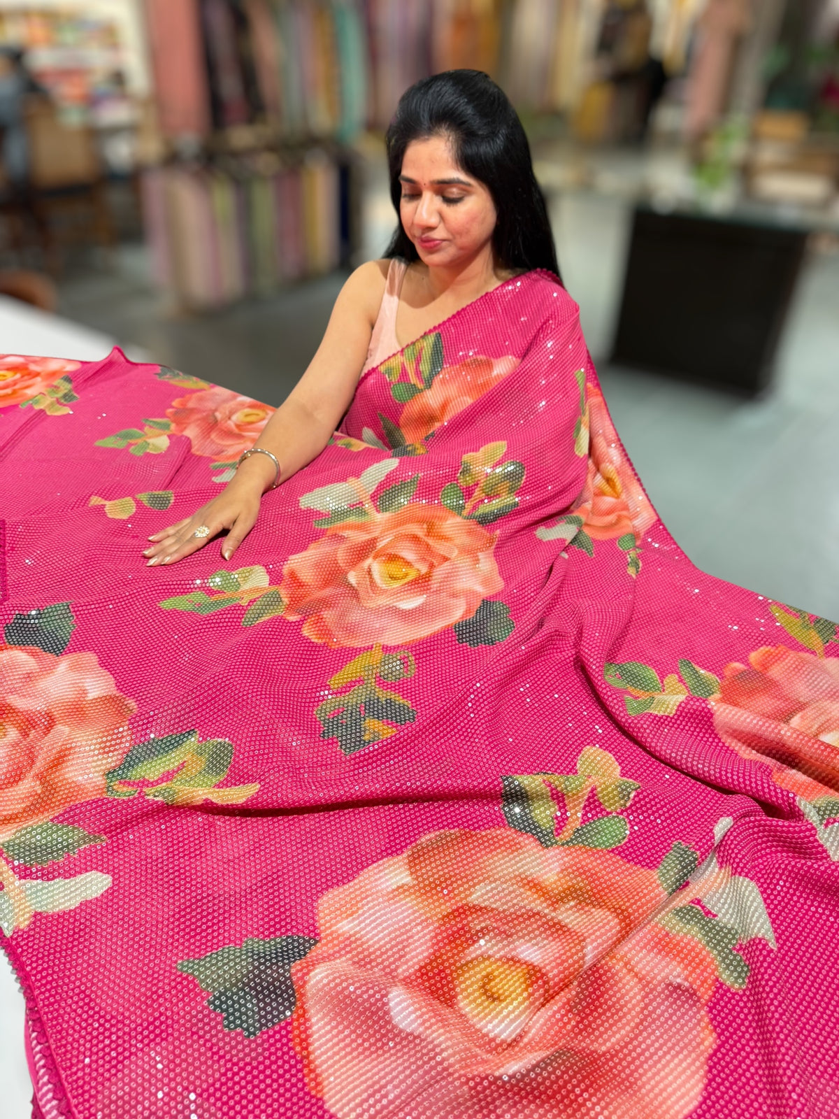 Dark Pink georgette sequence saree with statement floral print