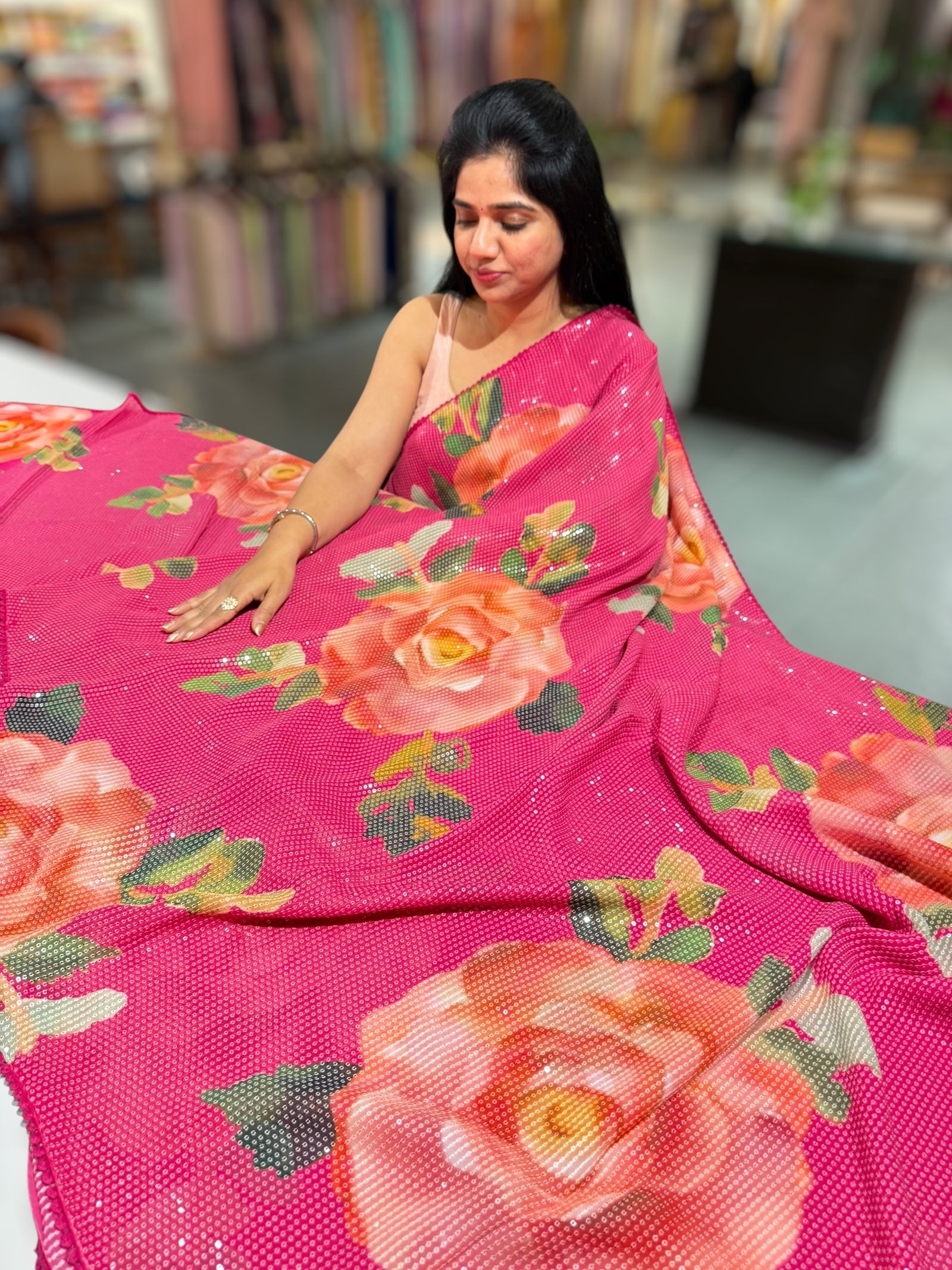 Dark Pink georgette sequence saree with statement floral print