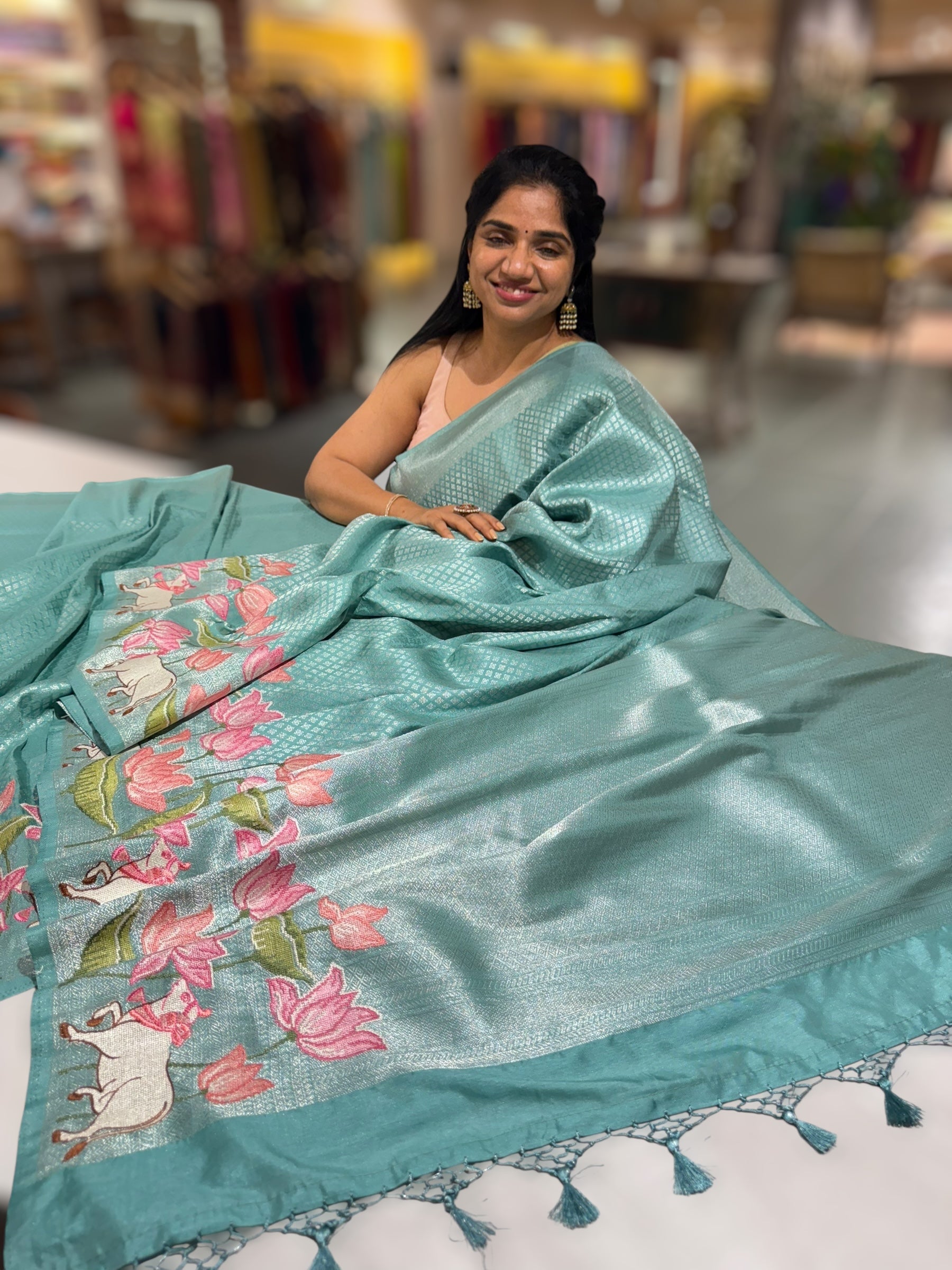Teal Blue Banarasi Brocade Saree with Pichwai Embroidered Skirt Border.