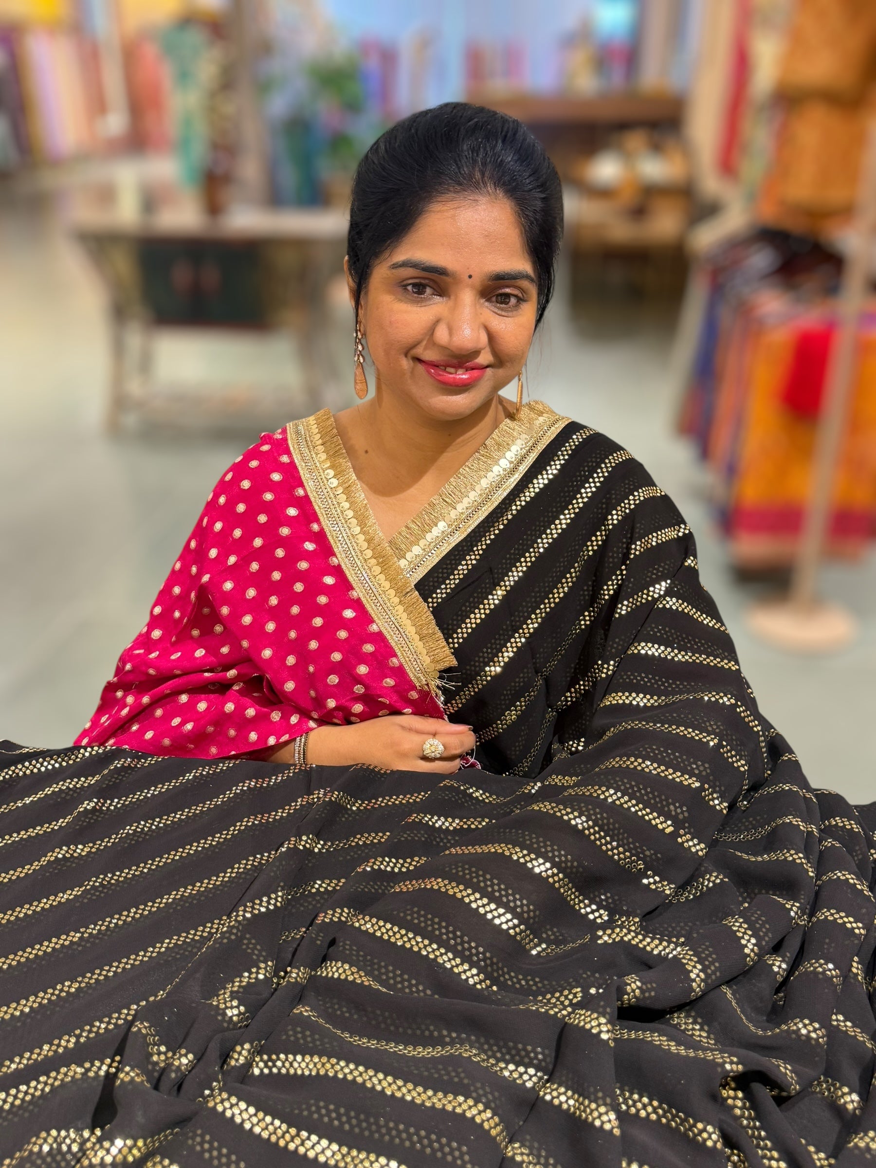 Black Georgette Saree with stick on Badla in stripes pattern and kiran Lace