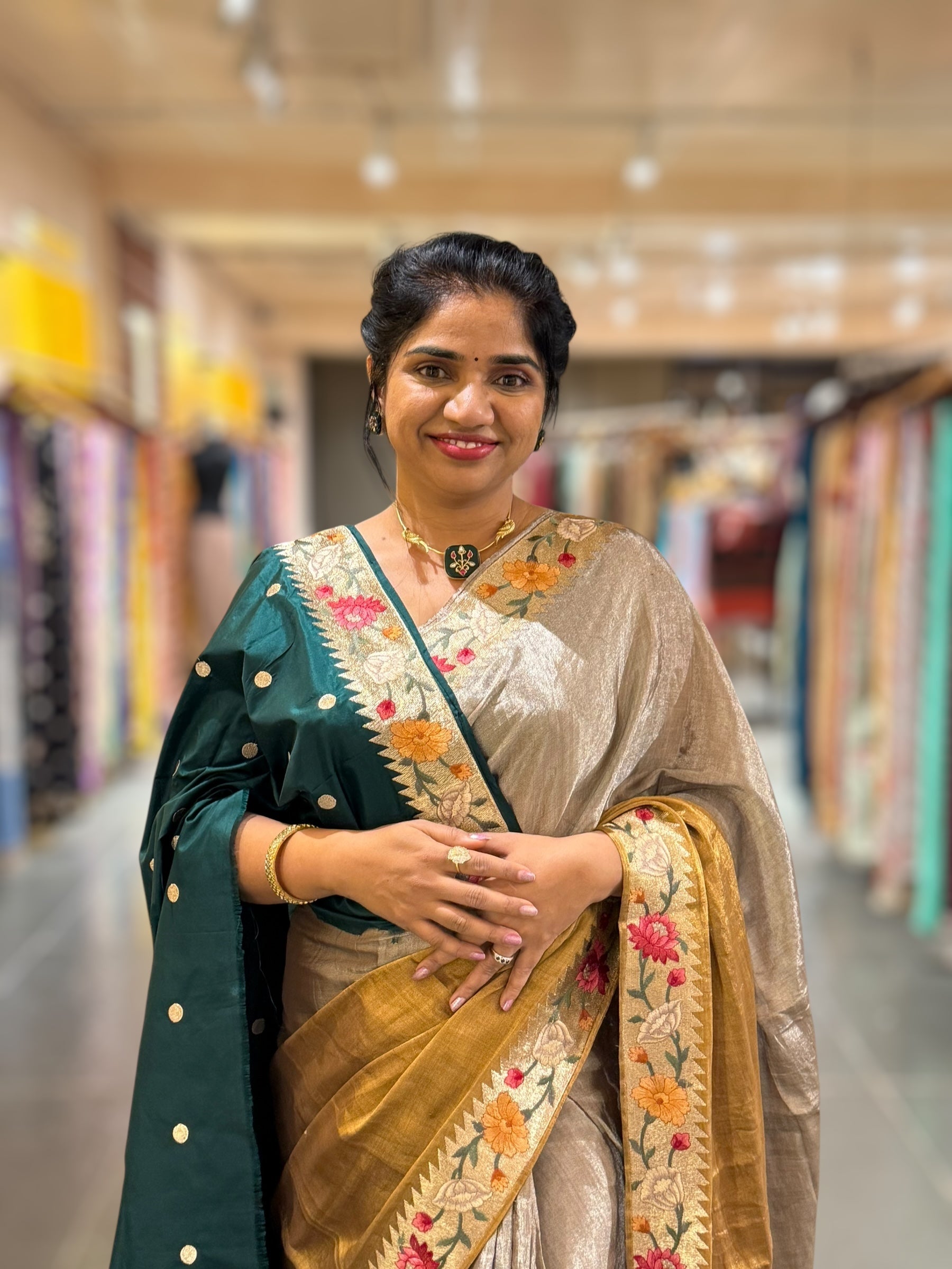 Handloom Tissue Saree with Paithani inspired embroidered border.