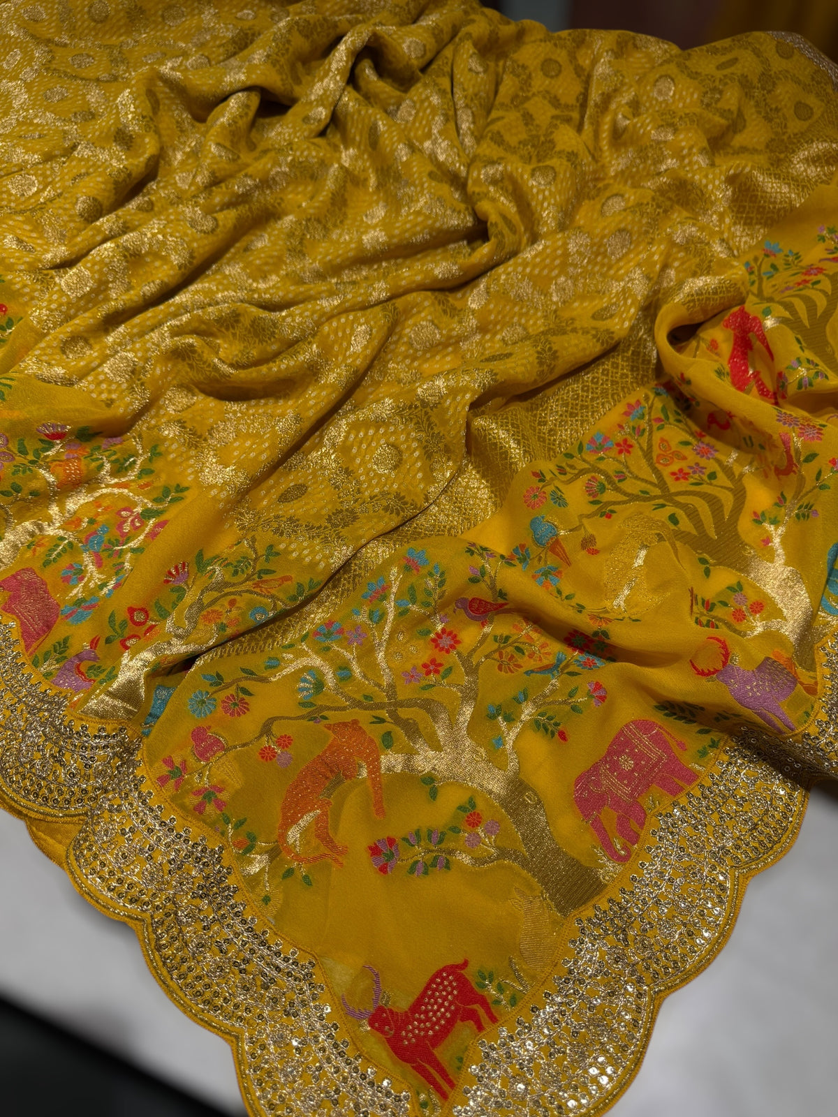 Yellow Bandhini Georgette Saree with sabya style scallop border