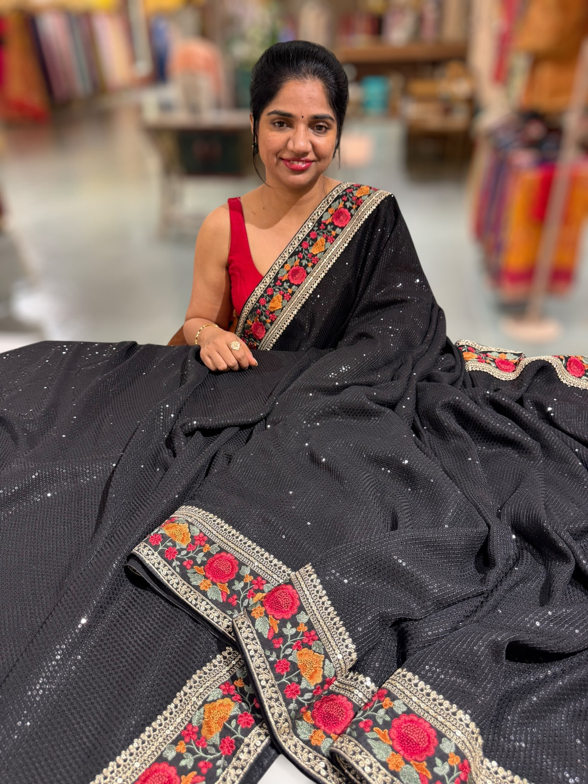 Black Georgette sequnce Saree with Sabyasachi borders and Blouse
